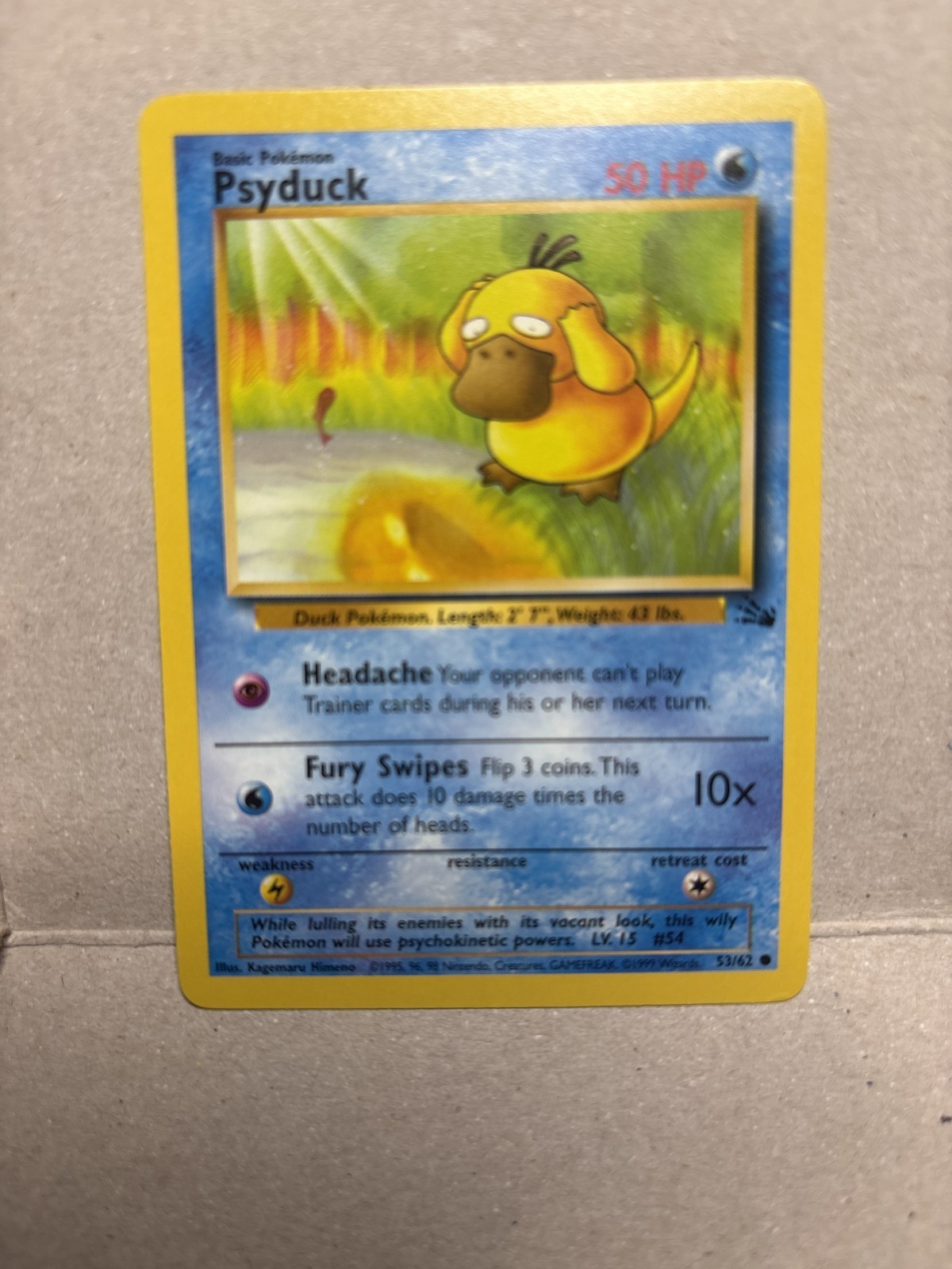 Psyduck 53/62 Common Fossil Unlimited Pokemon Card WOTC 1999 Vintage NM