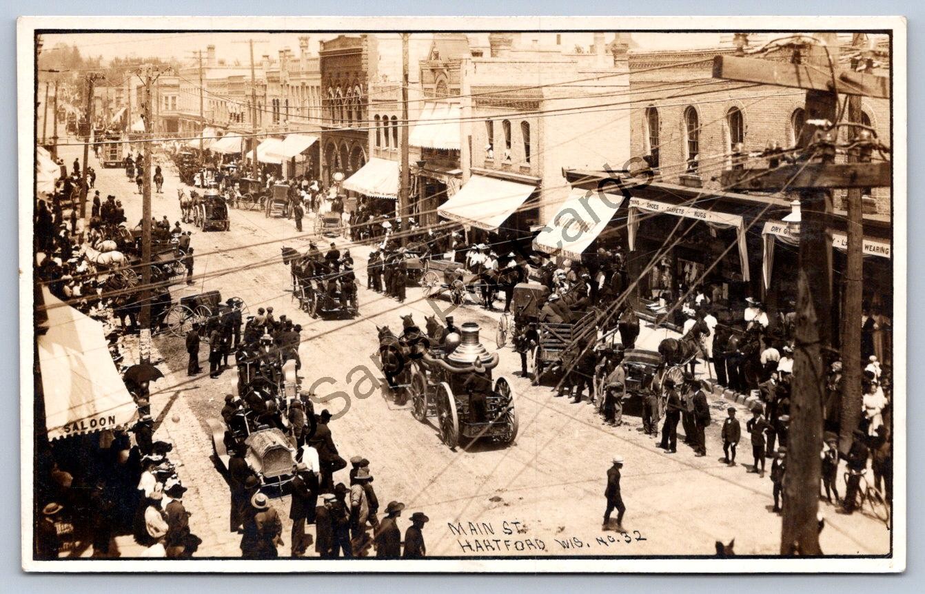 K67/ Hartford Wisconsin RPPC Postcard c1910 Main St Fire Department Parade 322 K67/ Hartford Wisconsin RPPC Postcard c1910 Main St Fire Department Parade 322