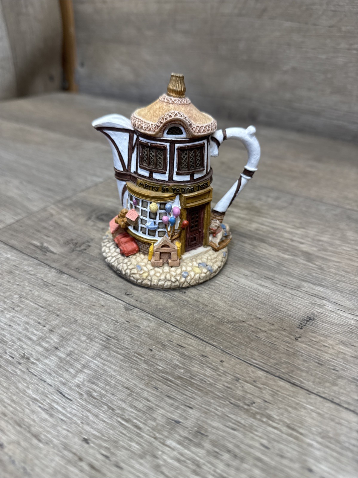 Vintage Hometown Teapot Cottage “Merry go round toys” 4.5” tall