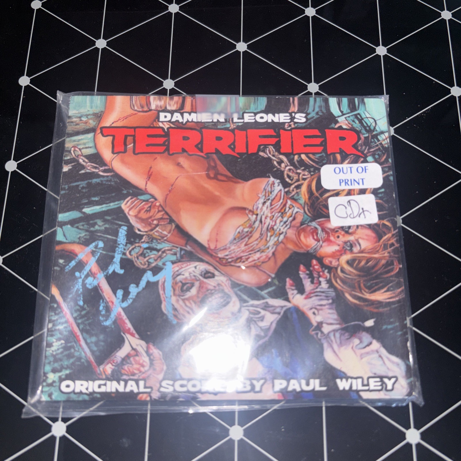 DAMIEN LEONE’S TERRIFIER CD SOUNDTRACK SIGNED BY COMPOSER PAUL WILEY BLUE INK