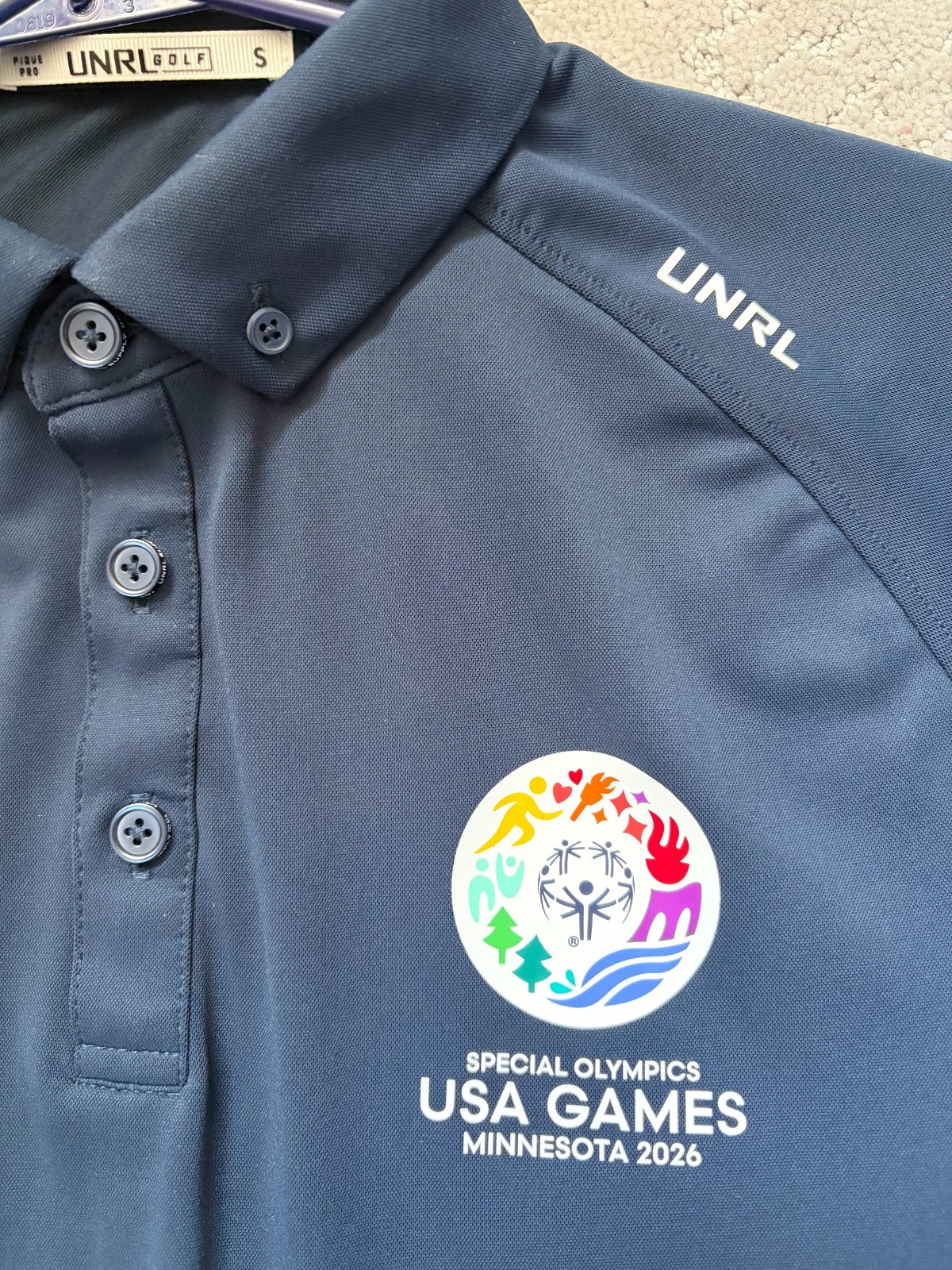 UNRL Special Olympics 2026 USA Games Polo. Small. Navy. Worn just once. UNRL Special Olympics 2026 USA Games Polo. Small. Navy. Worn just once.
