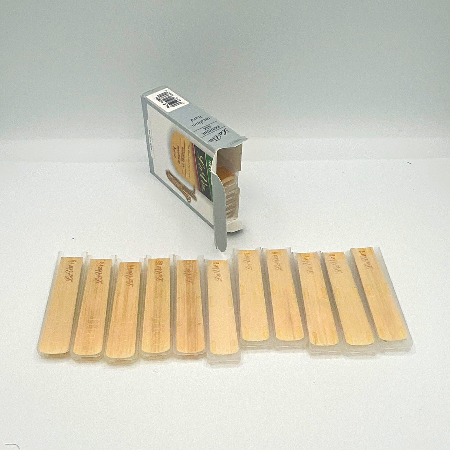 Lot of 18 assorted baritone sax reeds. Med soft med and med hard la voz