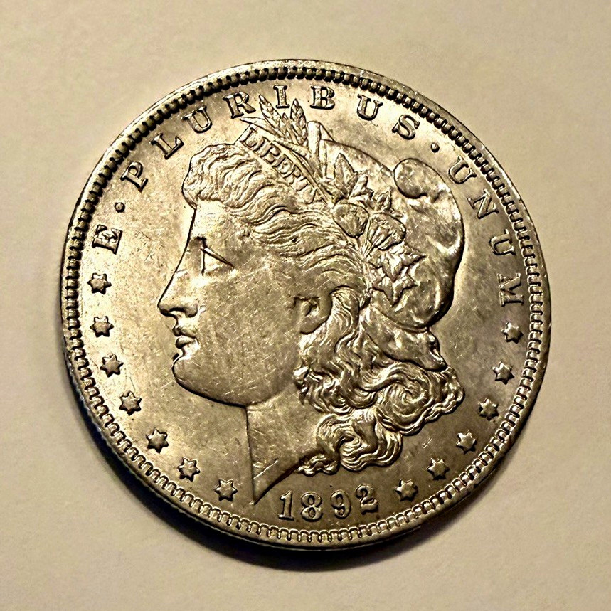 1892-O Morgan Silver Dollar UNC/AU Original Luster Rarer date/mint KM#110 1892-O Morgan Silver Dollar UNC/AU Original Luster Rarer date/mint KM#110