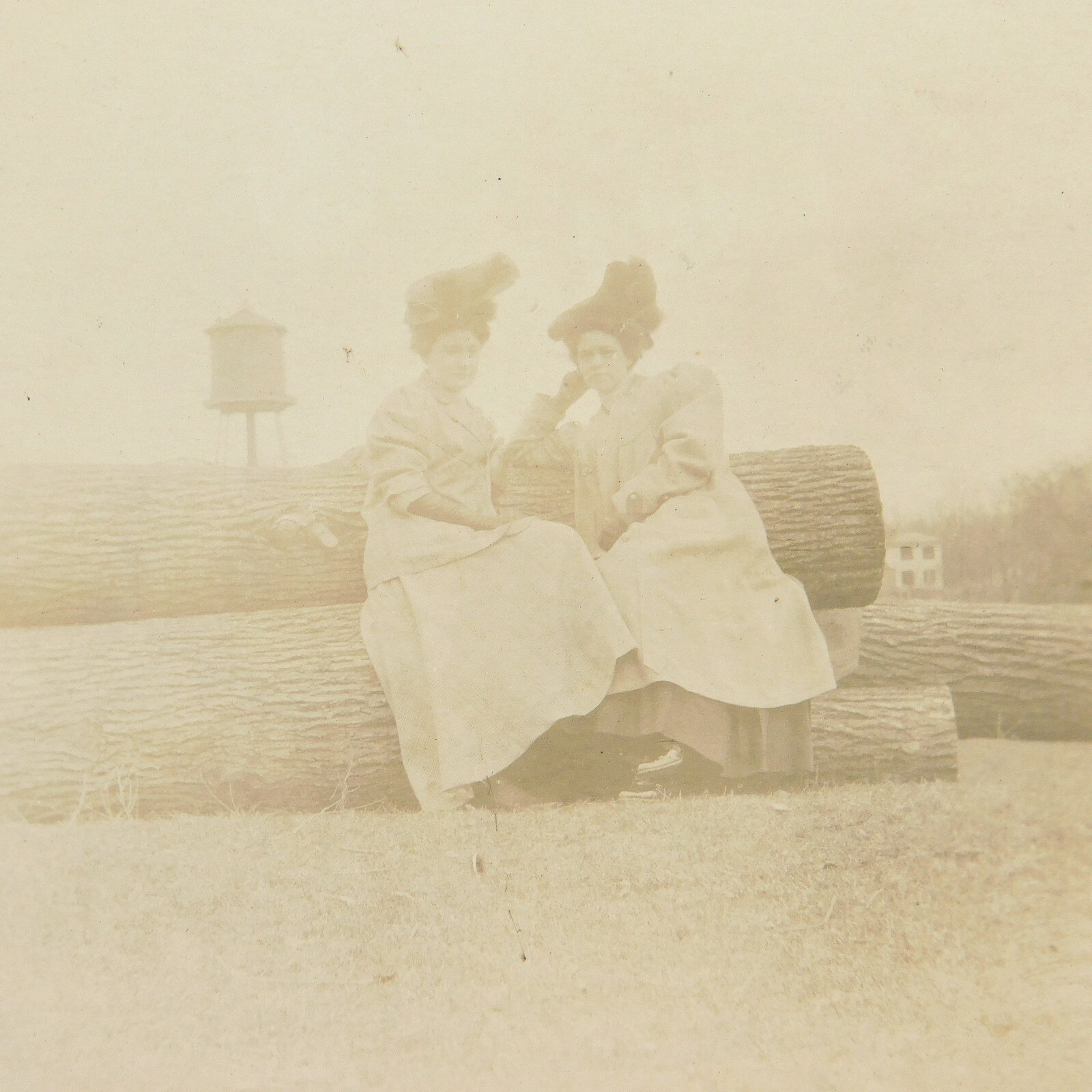 Vintage RPPC Two Women sitting on Logs in Dresses c. early 1900's Real Photo 