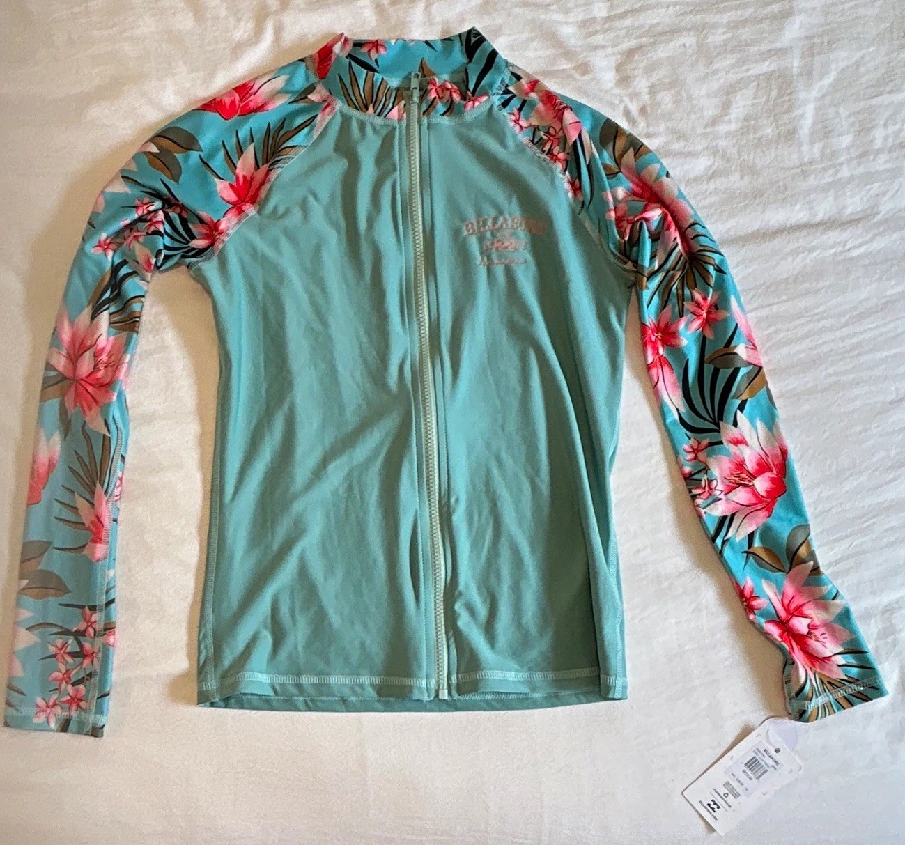 NWT Billabong Women’s Floral Teal Long sleeve Zip Front Rash guard Medium NWT Billabong Women’s Floral Teal Long sleeve Zip Front Rash guard Medium