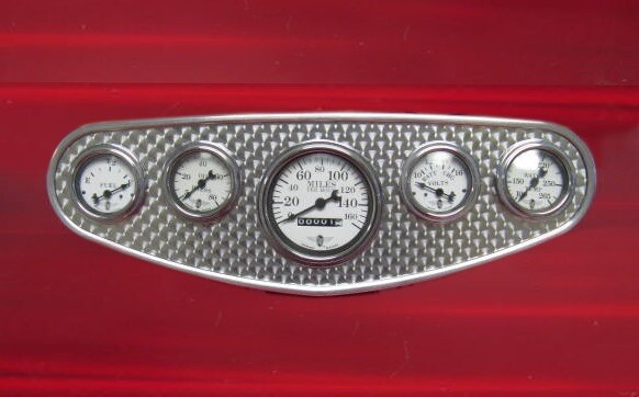 Stewart Warner style gauge panel with engine turned insert Stewart Warner style gauge panel with engine turned insert
