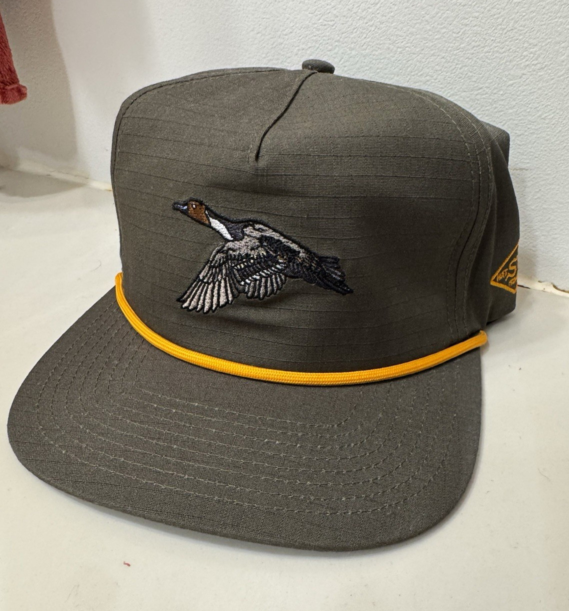Duck Camp Gray Cotton Ball Cap Hat w/ Flying Duck Patch, Yellow Trim, Adjustable Duck Camp Gray Cotton Ball Cap Hat w/ Flying Duck Patch, Yellow Trim, Adjustable