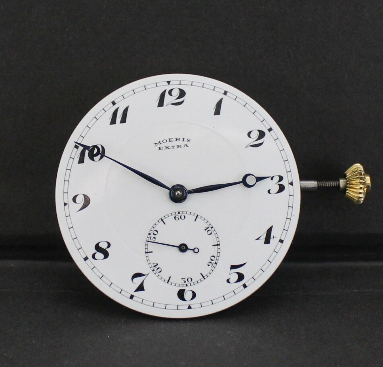 Antique Moeris manual Movement, dial, hands, winding stem & crown . Running
