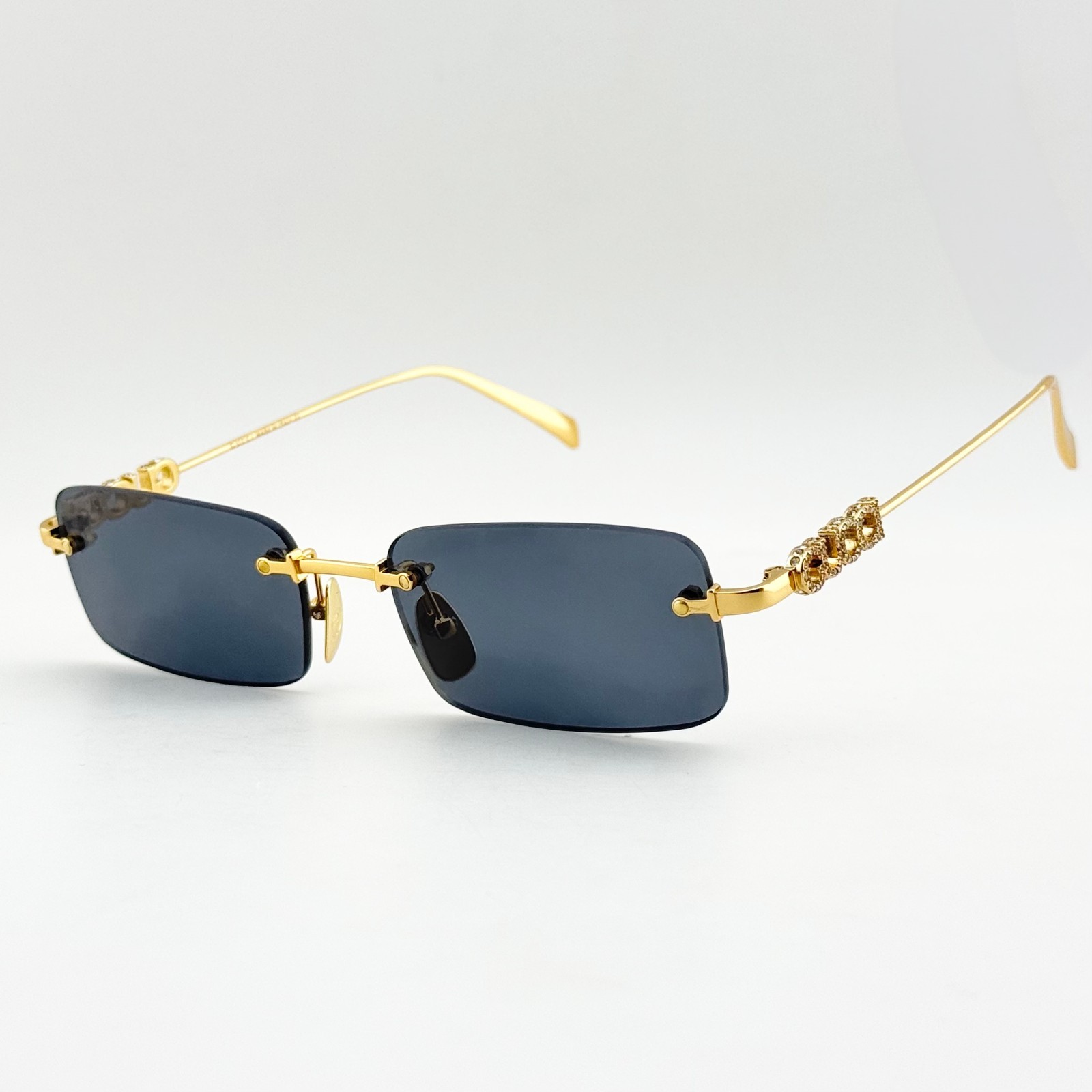 Gucci GG1808S Rimless Rectangle Sunglasses Gold Frame Gray Lens 52mm Unisex