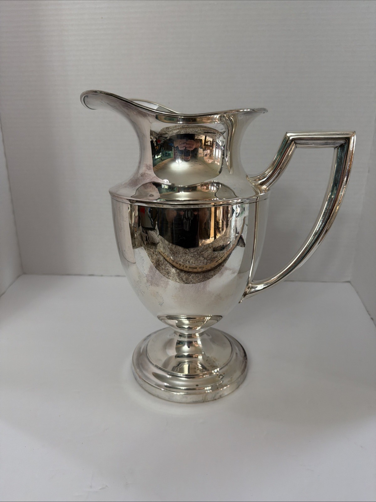 Vintage Lehman Brothers vintage silver-plated water pitcher. Vintage Lehman Brothers vintage silver-plated water pitcher.