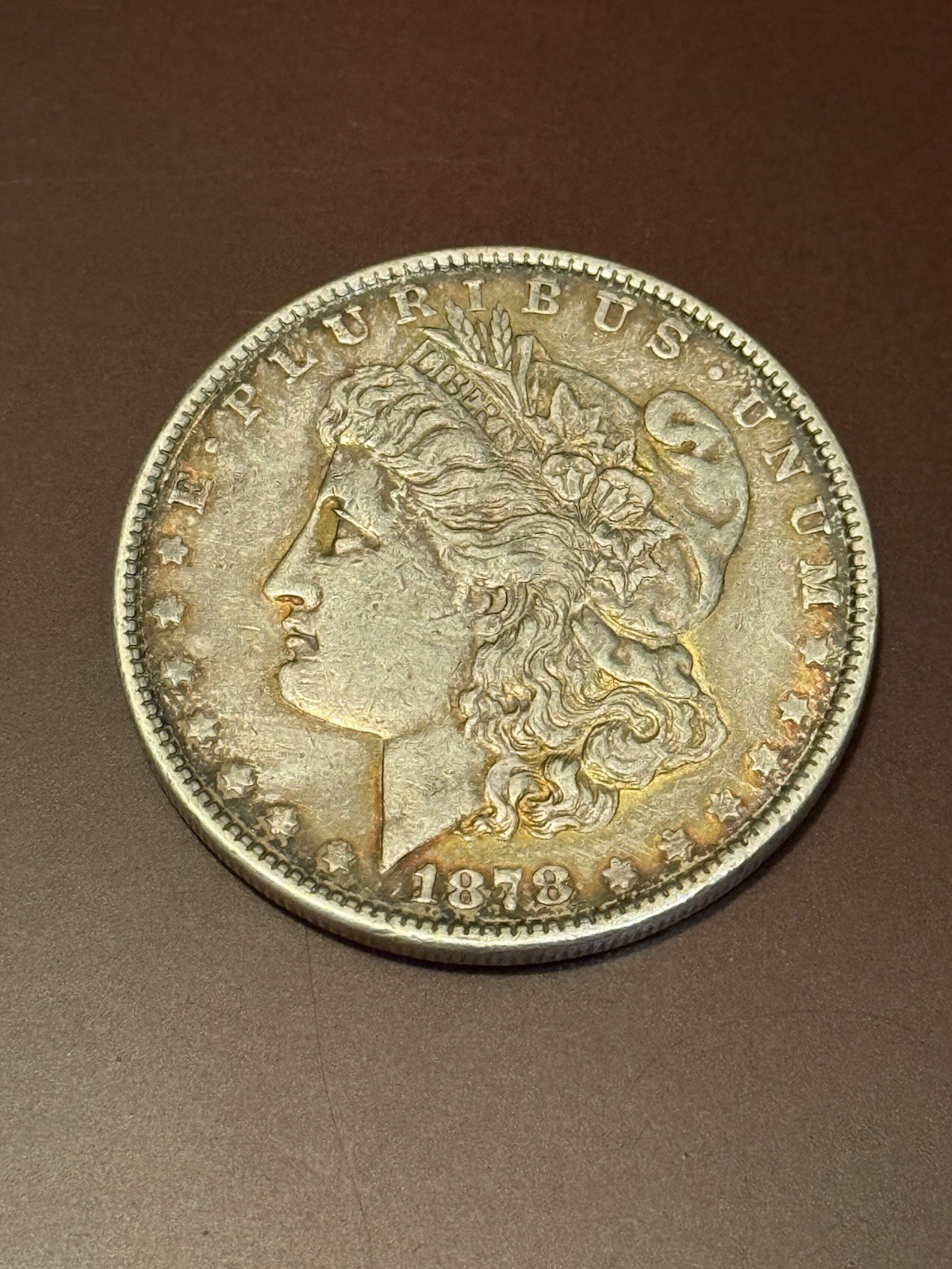 1878-P Morgan Silver Dollar toned.