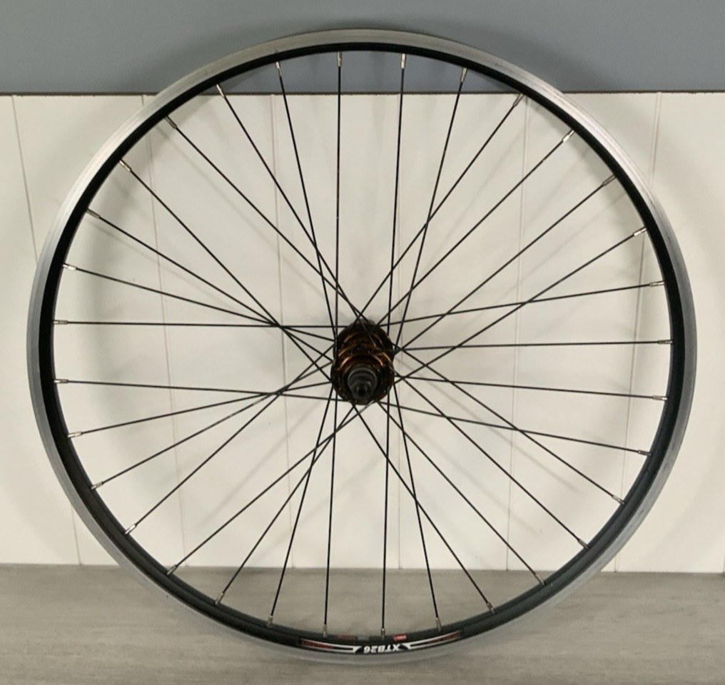 WEINMANN XT REAR WHEEL 26 INCH 24 MM WIDE 32 HOLE SCHRADER CLINCHER 7, 8, OR 9 S