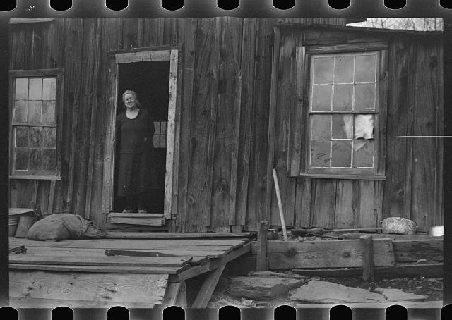 Photo:Rural Cabin Woman Doorway 1930s Wooden Shack Porch