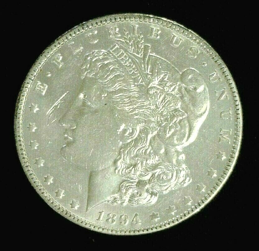 1894-O MORGAN SILVER DOLLAR UNC CLEANED SCRATCHED. REDUCED 5/6/26 (959) 1894-O MORGAN SILVER DOLLAR UNC CLEANED SCRATCHED. REDUCED 5/6/26 (959)