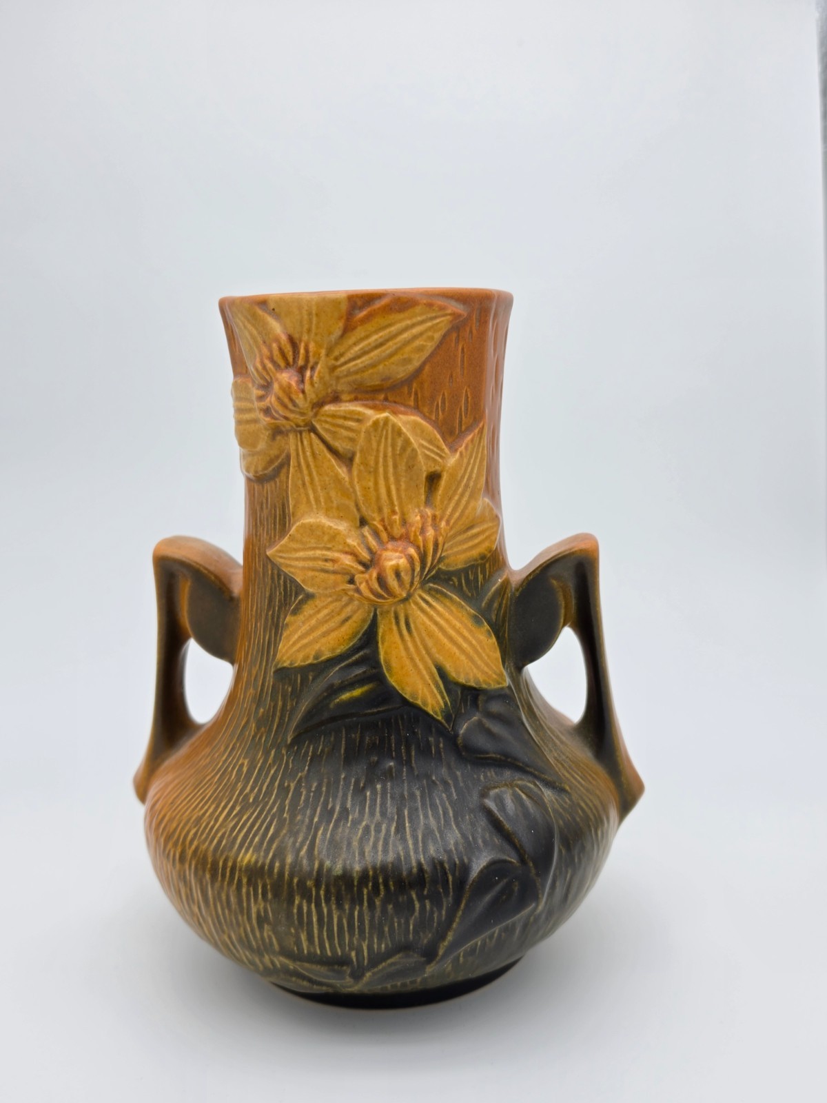 Roseville Pottery Clematis 106‑7 Vase – Brown/Black – Floral Relief – USA Roseville Pottery Clematis 106‑7 Vase – Brown/Black – Floral Relief – USA