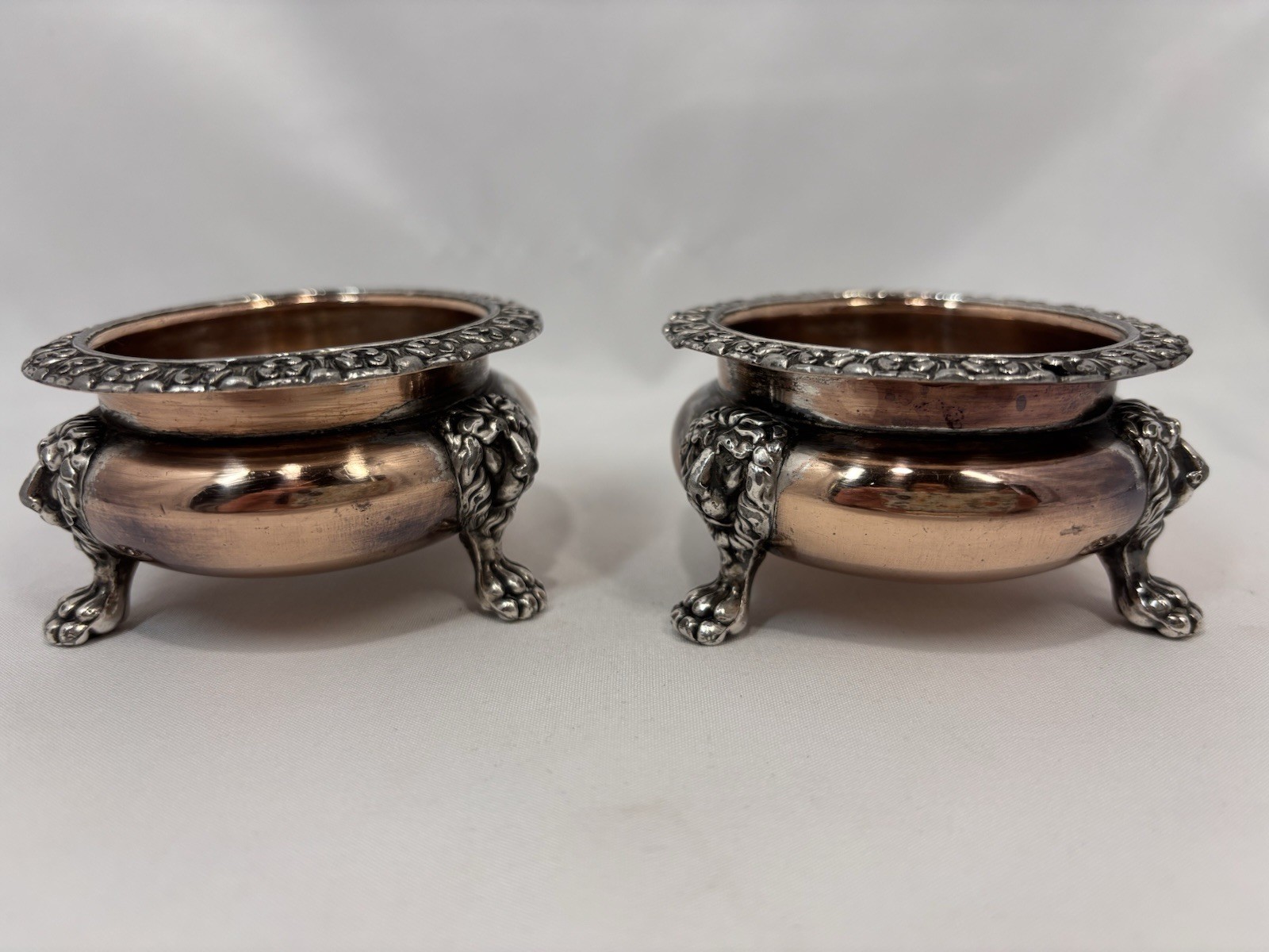 ANTIQUE LIONHEAD Feet SALT CELLAR PAIR REPOUSSE FLORAL ENGLISH SILVERPLATE Read