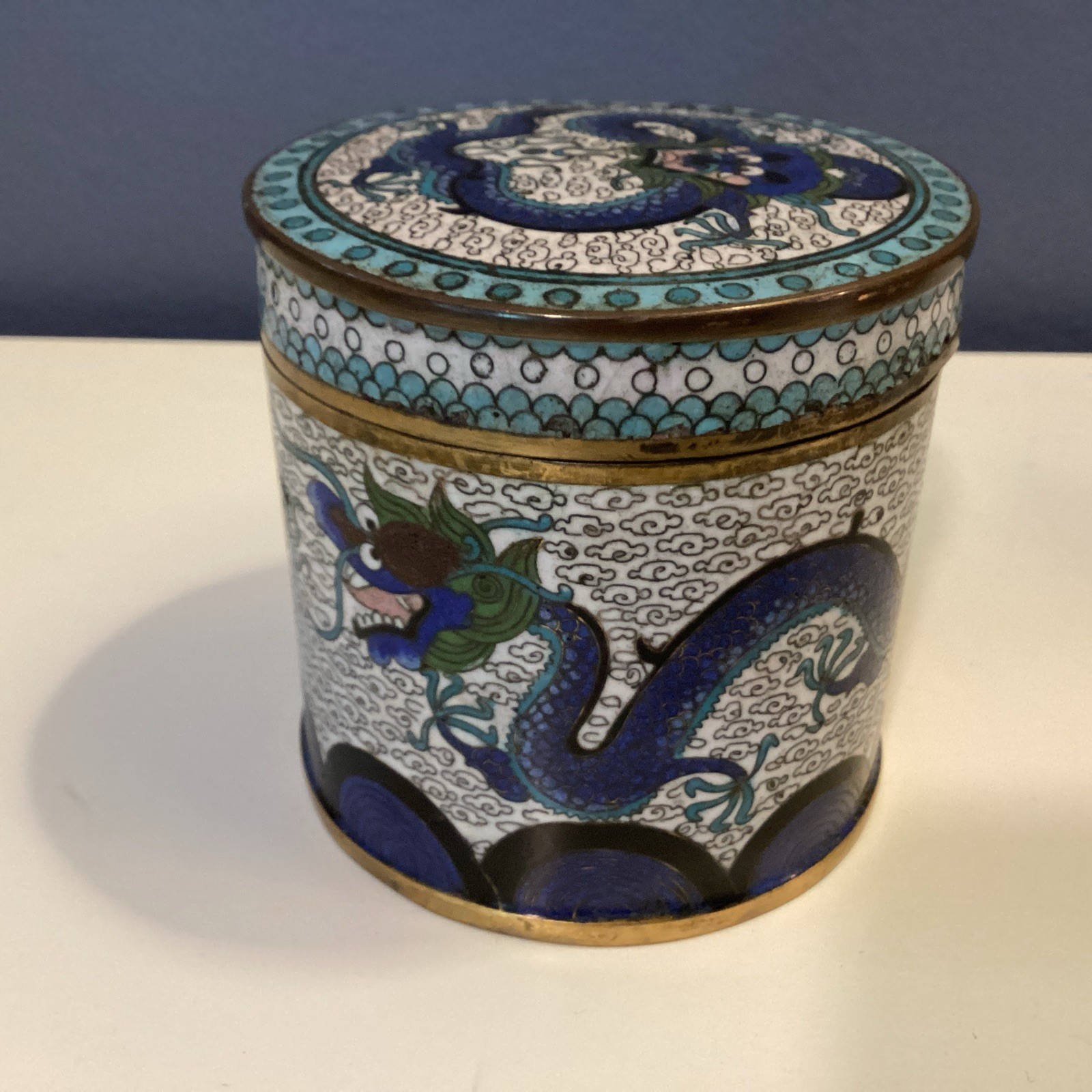 A 19th/20th century Chinese gilded enamel cloisonne dragon box A 19th/20th century Chinese gilded enamel cloisonne dragon box