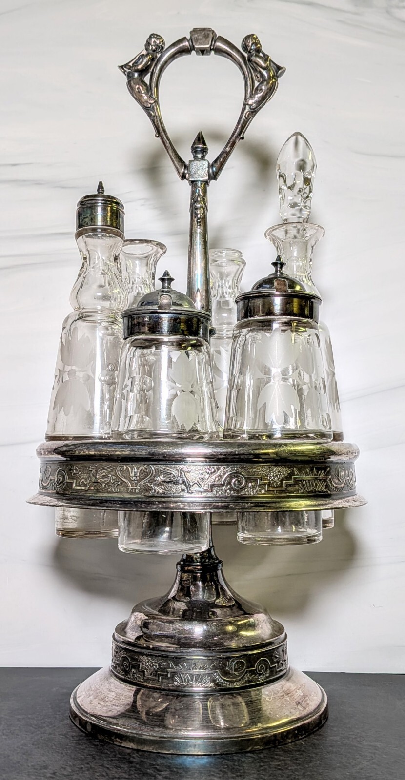 Antique Victorian Silver Plate Revolving Castor Cruet Set Etched Bottles Cherub
