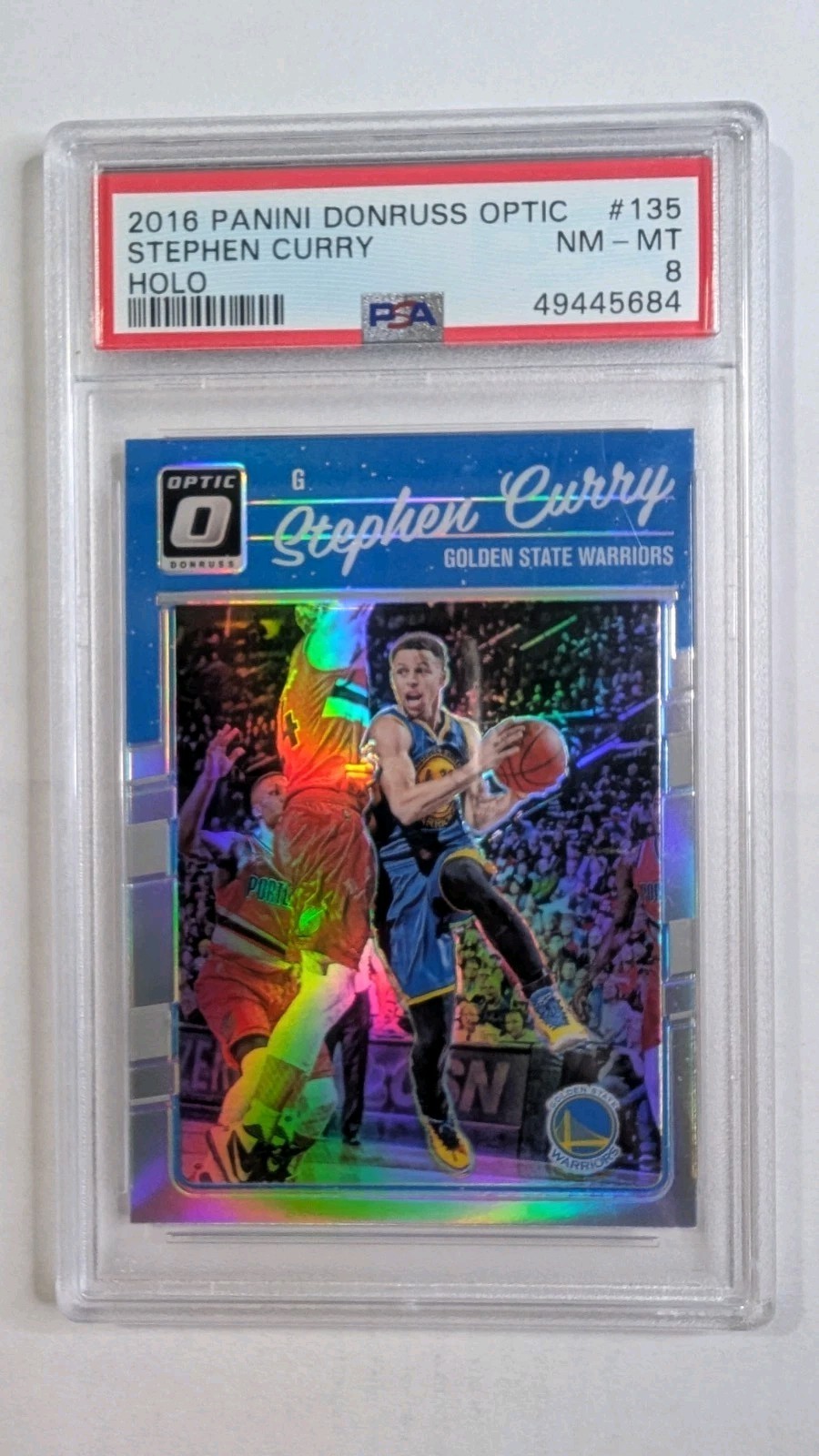 2016-17 Panini Donruss Optic Stephen Curry Warriors #135 Holo PSA 8 NM-MT MVP 2016-17 Panini Donruss Optic Stephen Curry Warriors #135 Holo PSA 8 NM-MT MVP