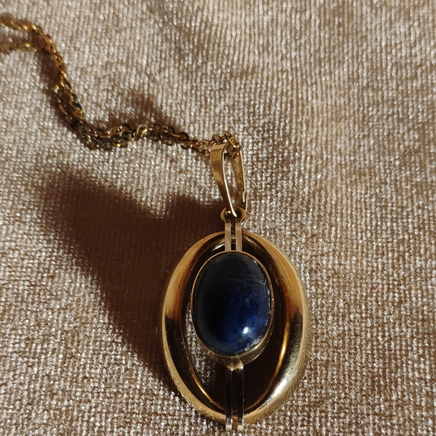 Vintage German 8k gold pendant with Lapis Lazuli (?) stone. chain gold plated Vintage German 8k gold pendant with Lapis Lazuli (?) stone. chain gold plated