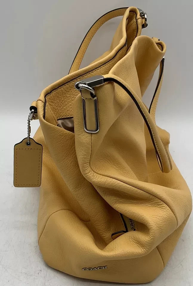 Coach handbag yellow new with out tag medium Coach handbag yellow new with out tag medium