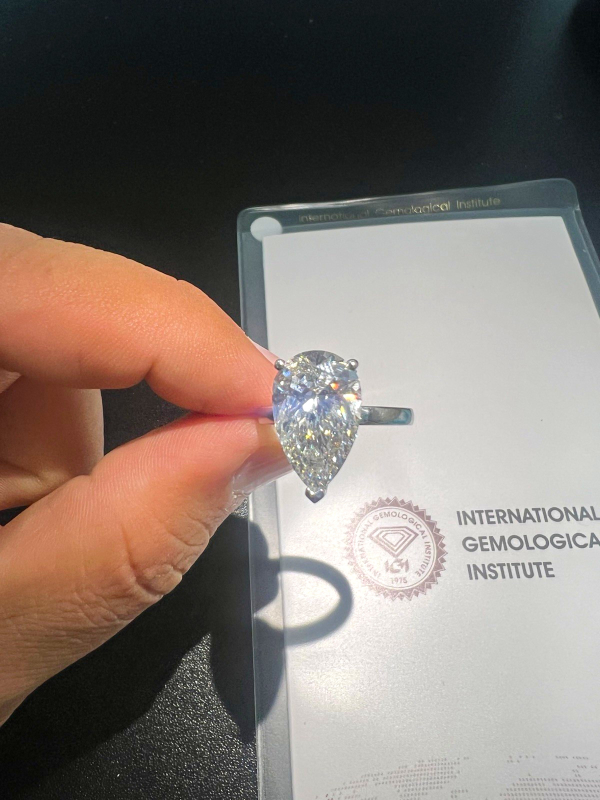 WHITE GOLD RING SIZE 6.5 WITH 6 CT VS2 F PEAR LAB GROWN DIAMOND IGI CERTIFIED WHITE GOLD RING SIZE 6.5 WITH 6 CT VS2 F PEAR LAB GROWN DIAMOND IGI CERTIFIED