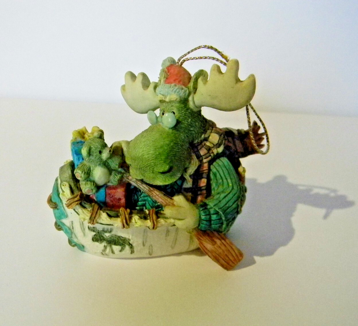 Moose Creek Crossing \'Ollie Olsen as Santa\' in a Canoe Collectible Ornament 