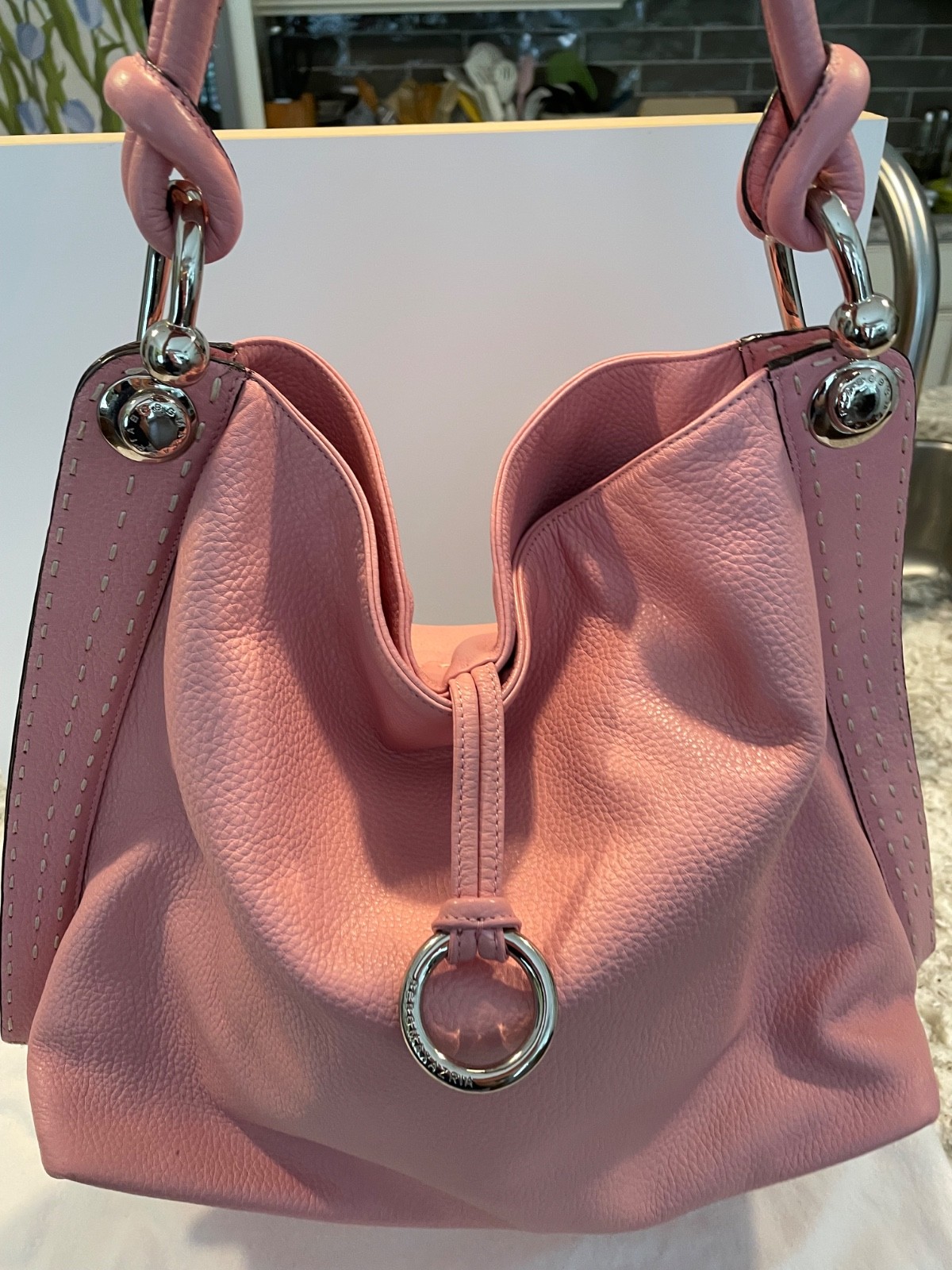 Vintage BCBG pink pebbled leather handbag with silver hardware includes dust bag