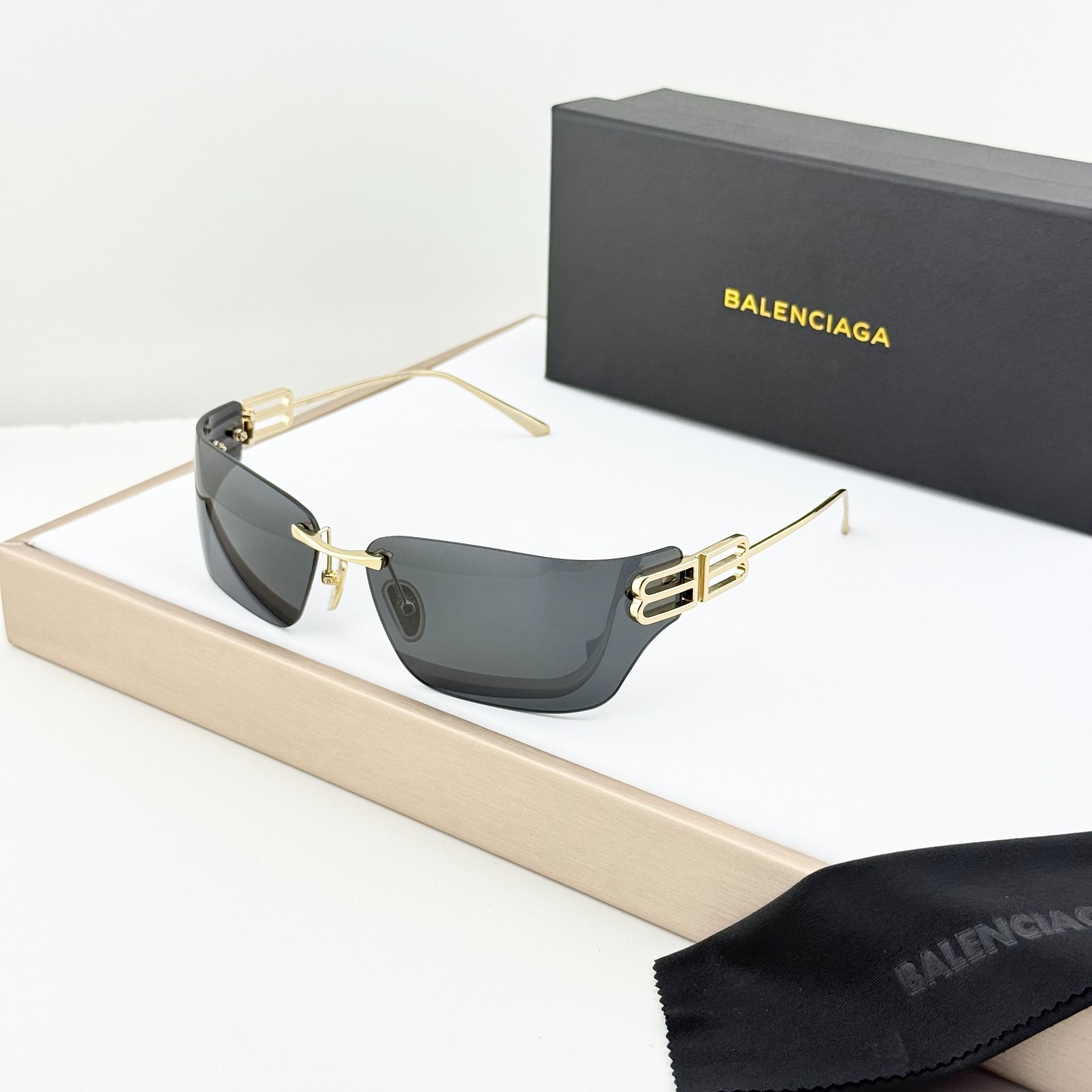 Balenciaga BB0485SA Rimless Gold Frame Black Lens Rectangle Sunglasses 76mm