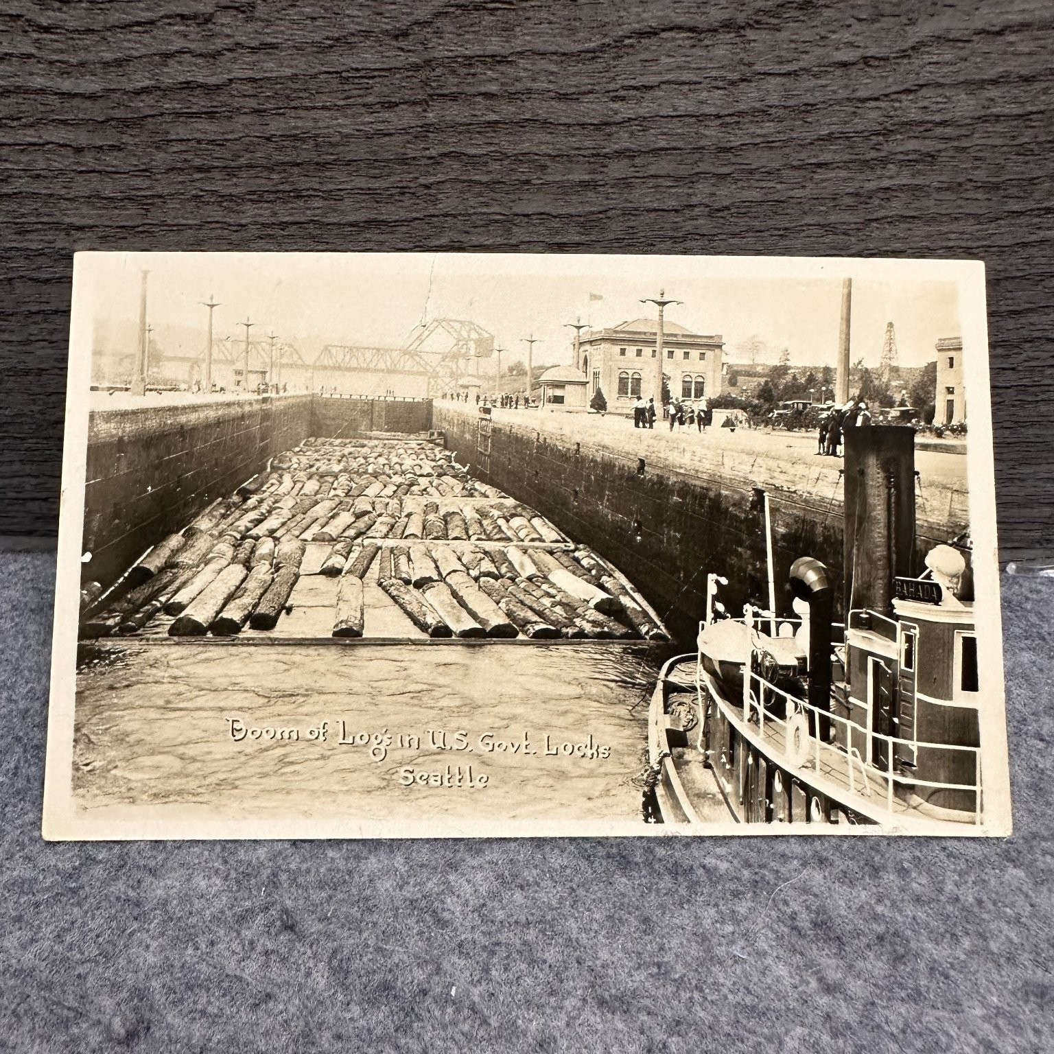 RPPC Boom of Logs US Govt Locks Seattle Washington Tugboat Vintage crease