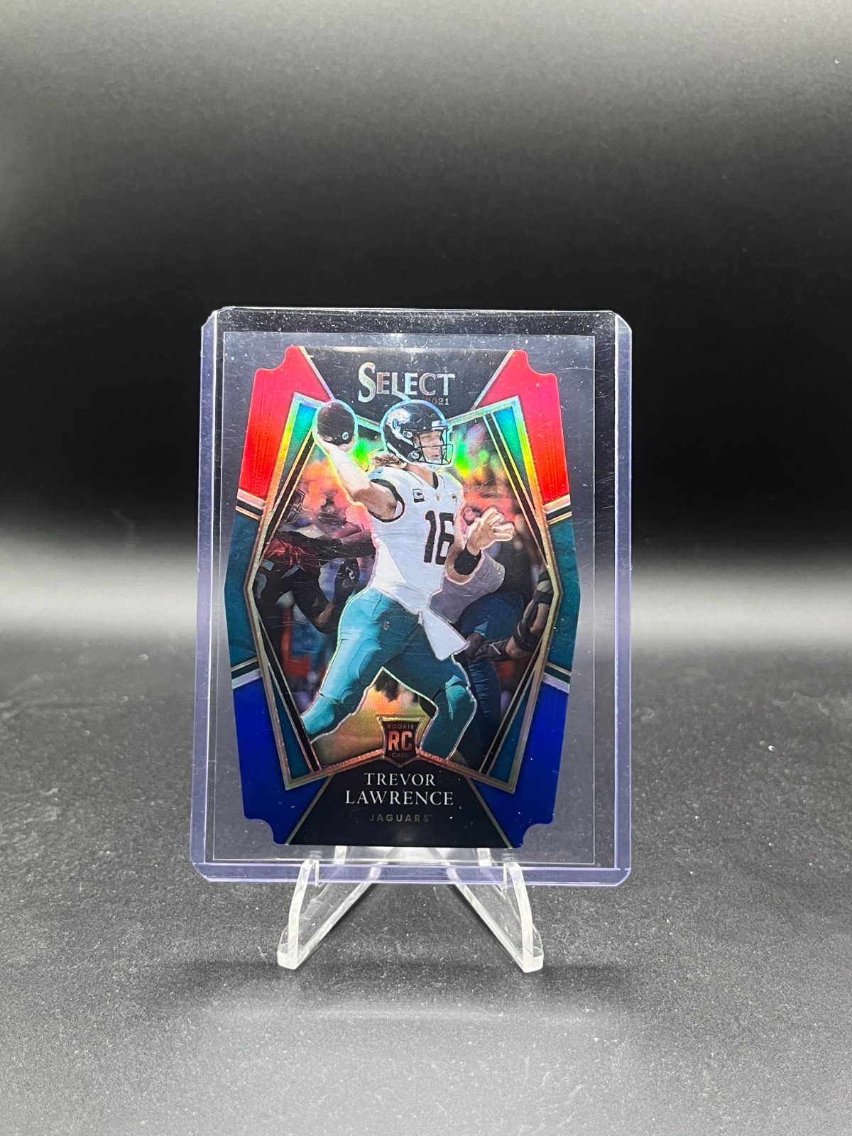 2021 Panini Select - Trevor Lawrence (#143) - Red & Blue Prizm Die-Cut - Jags 2021 Panini Select - Trevor Lawrence (#143) - Red & Blue Prizm Die-Cut - Jags