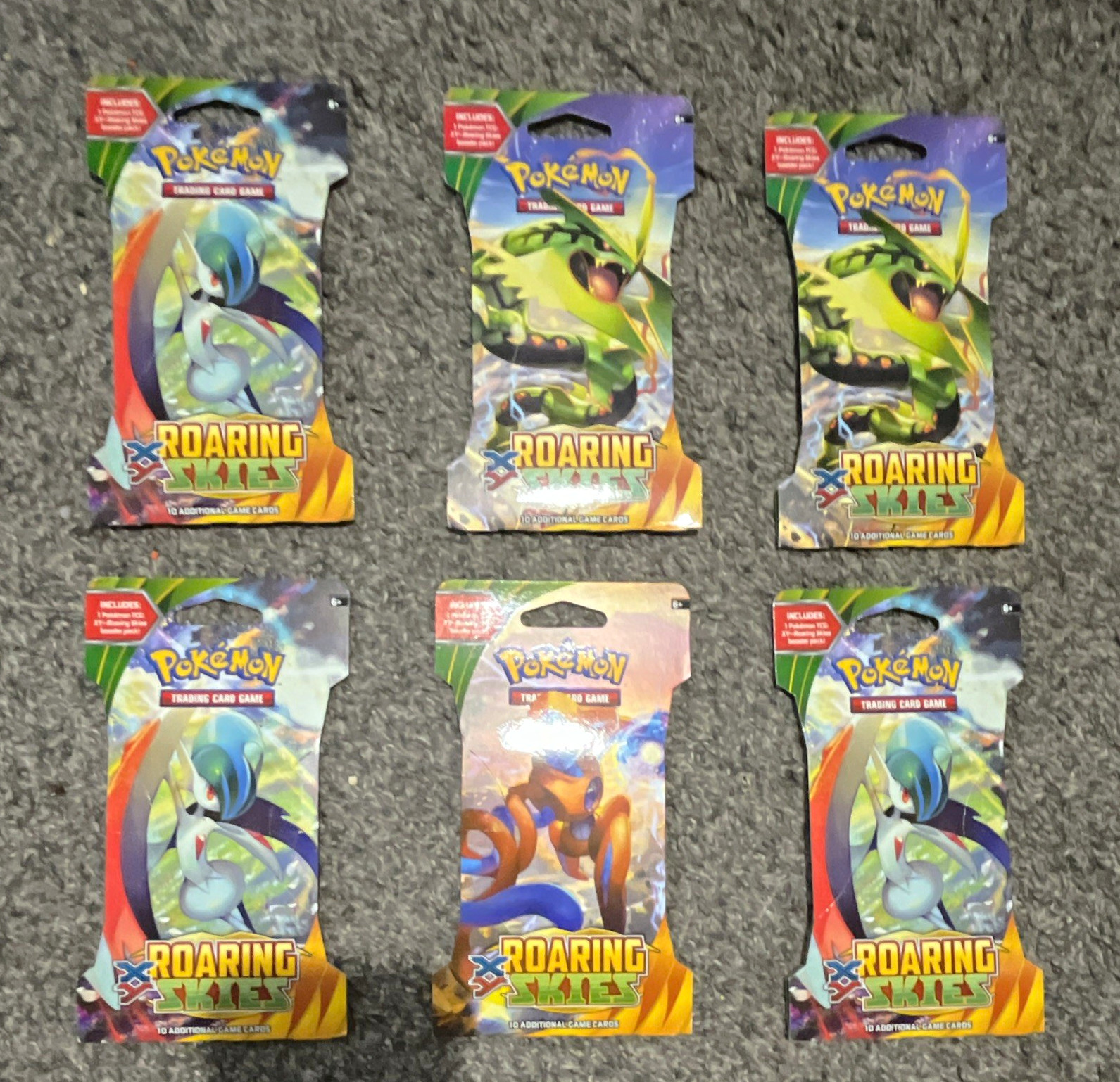 Pokémon TCG Roaring Skies Sleeved Booster Pack Lot 6 Packs (10 Cards Each) 2015