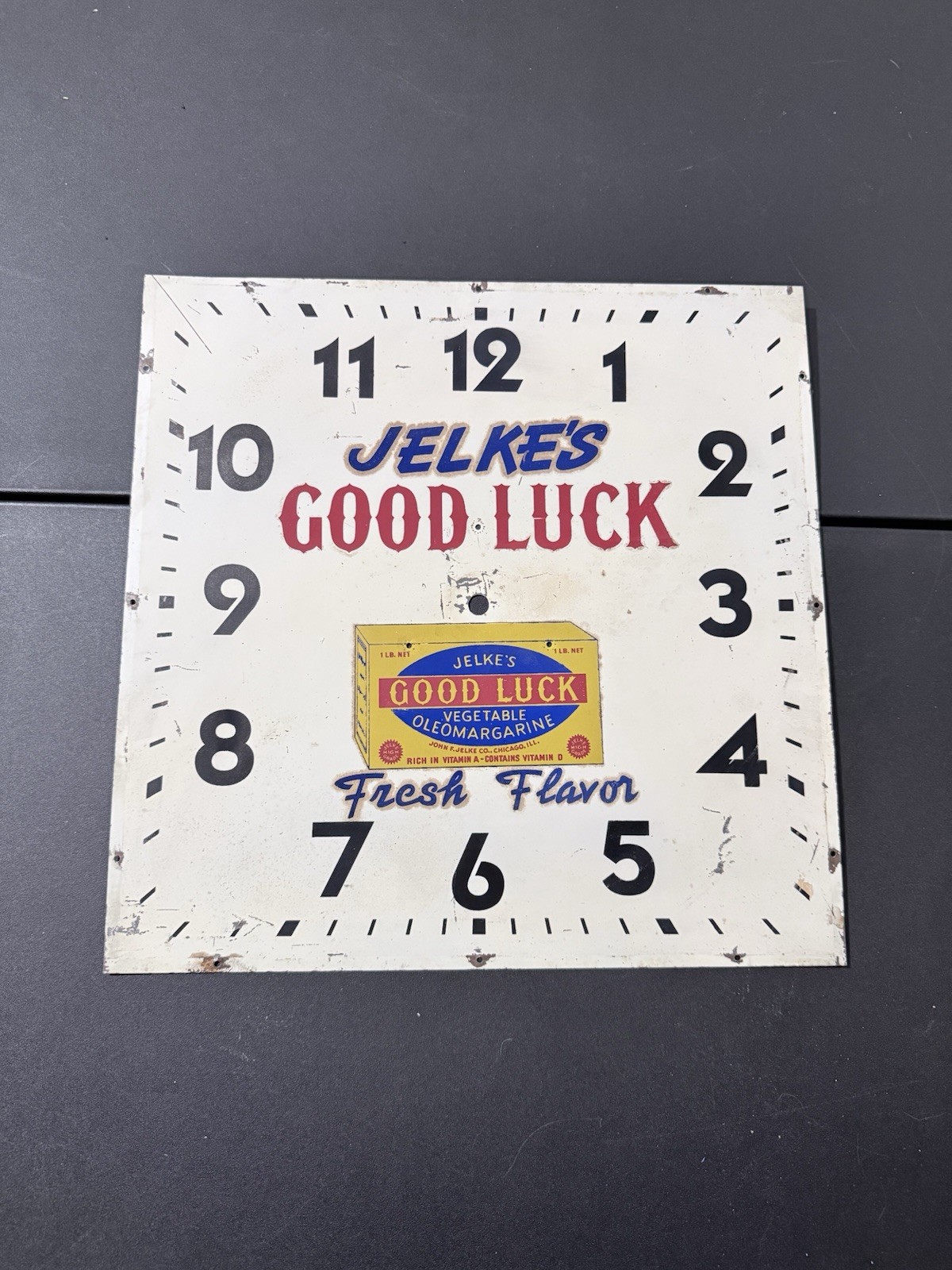 Jelkes Good Luck Oleomargarine Tin Clock Face Advertising Sign