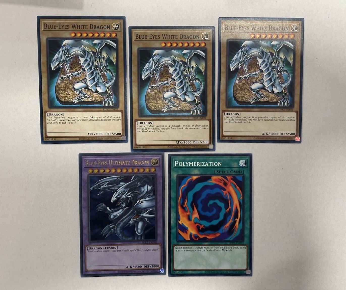 YU-GI-OH 3X BLUE EYES WHITE DRAGON + ULTIMATE DRAGON POLYMERIZATION SET LDK2 NM