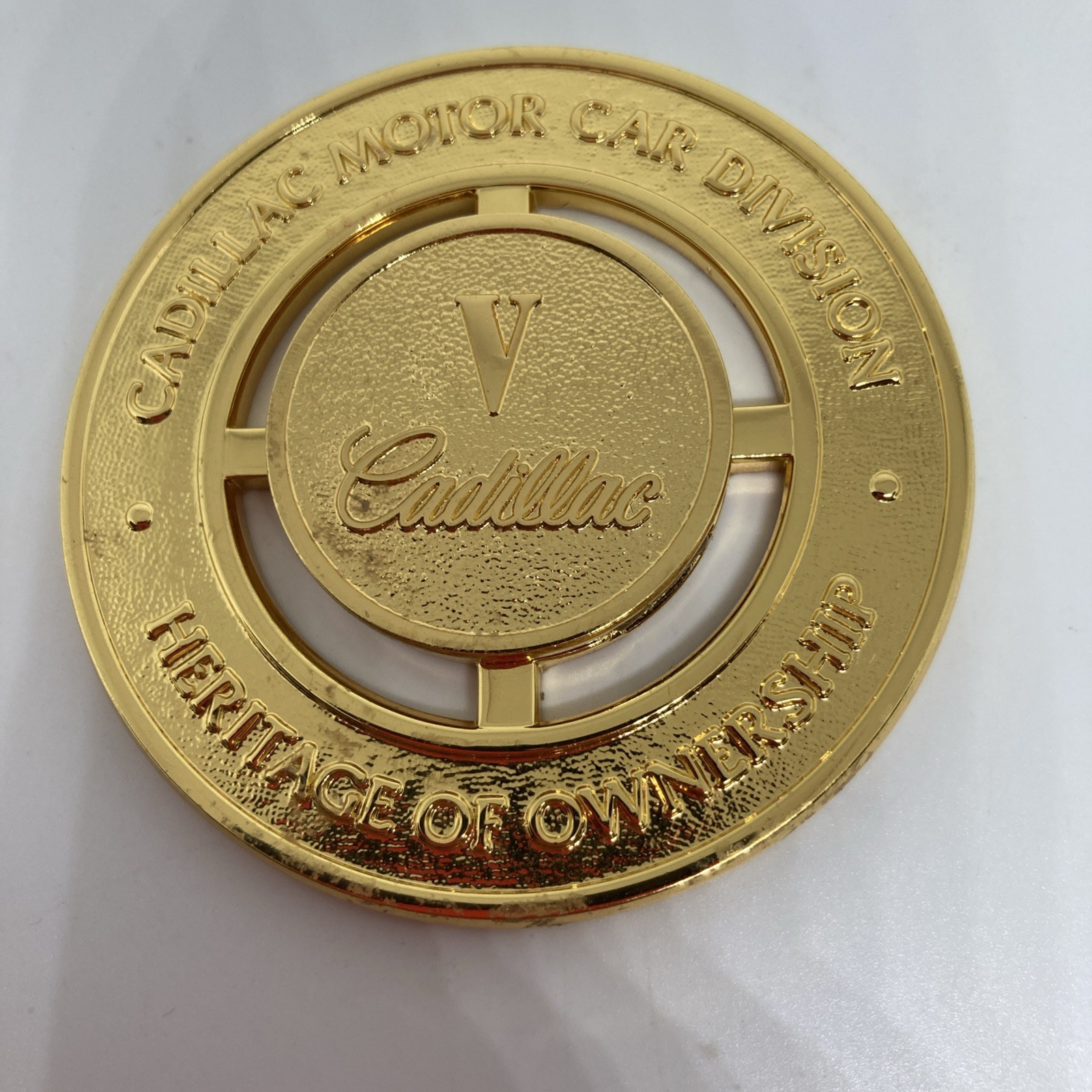 Cadillac V - Motor Car Division - Heritage of Ownership - GOLD Grille Medallion