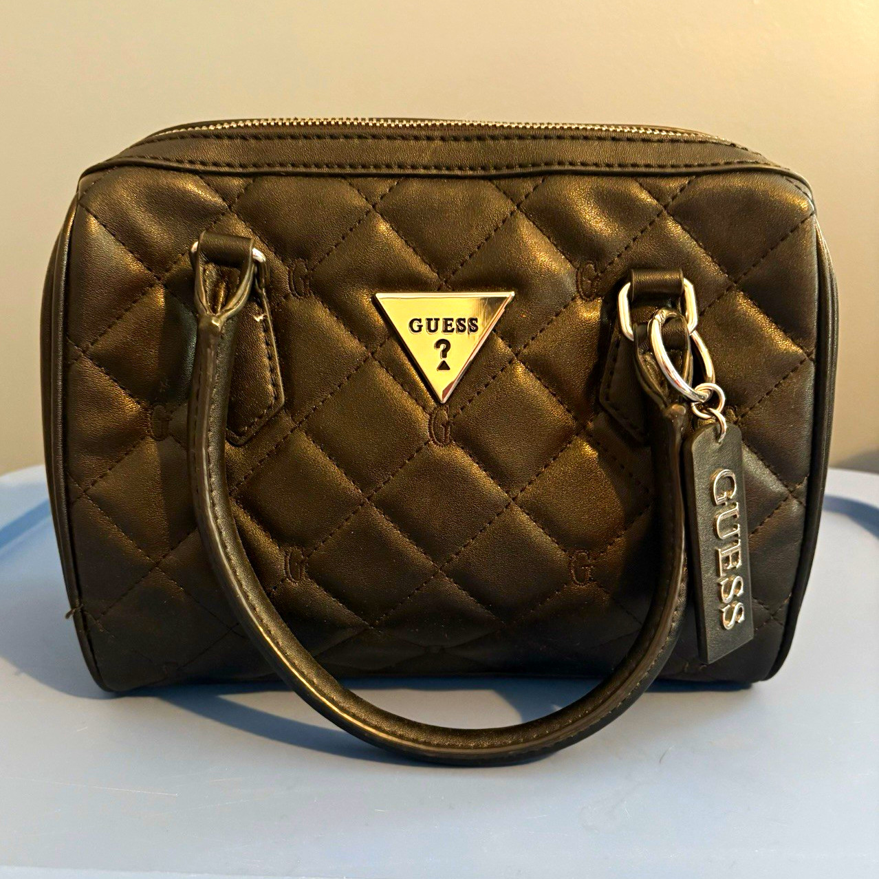 GUESS Black Quilted Zip Top Handle Satchel Logo Pattern Inner Pockets Silver