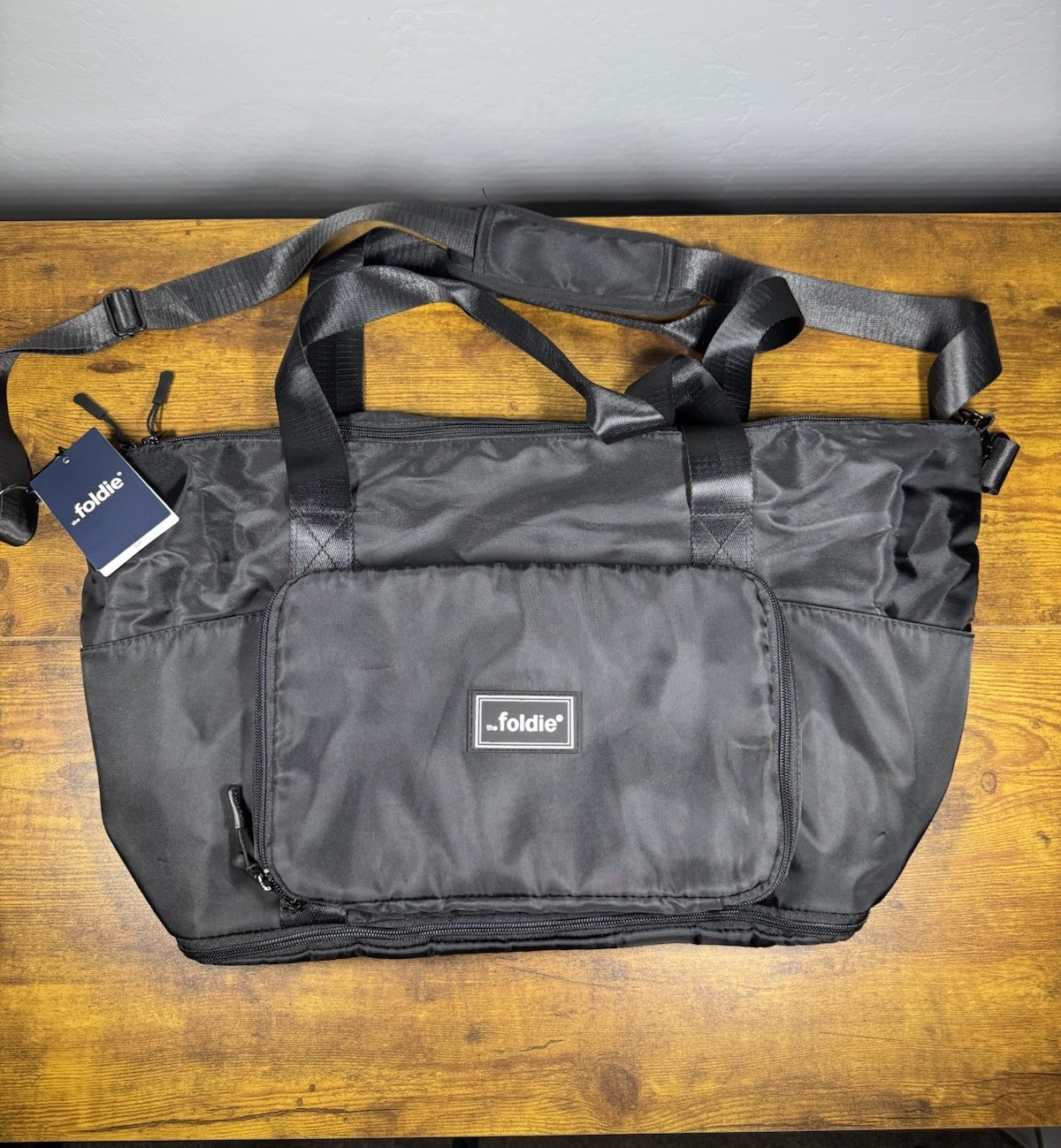 The Foldie Travel Bag Black 40L Tote Waterproof Shoulder Strap Zip NWT The Foldie Travel Bag Black 40L Tote Waterproof Shoulder Strap Zip NWT