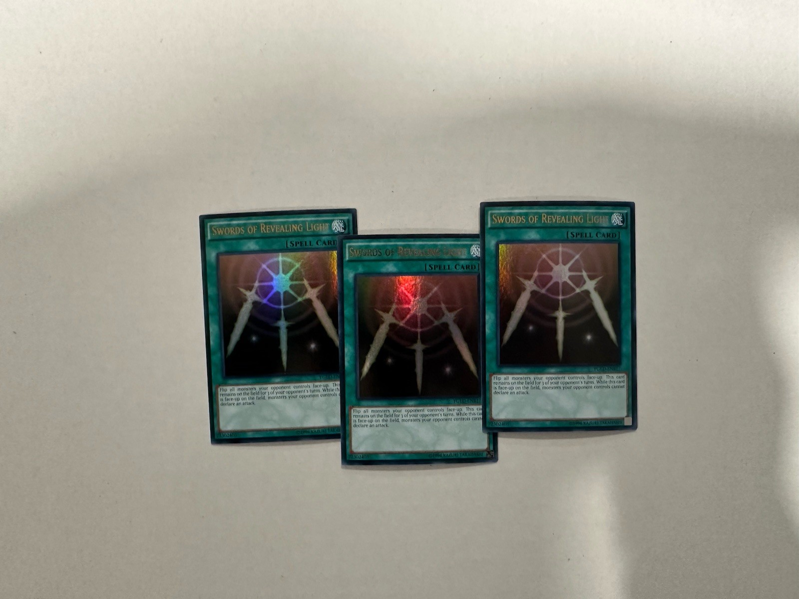 3x Yugioh Swords of Revealing Light YGLD-ENB17 Ultra Rare NM PLAYSET 3x Yugioh Swords of Revealing Light YGLD-ENB17 Ultra Rare NM PLAYSET