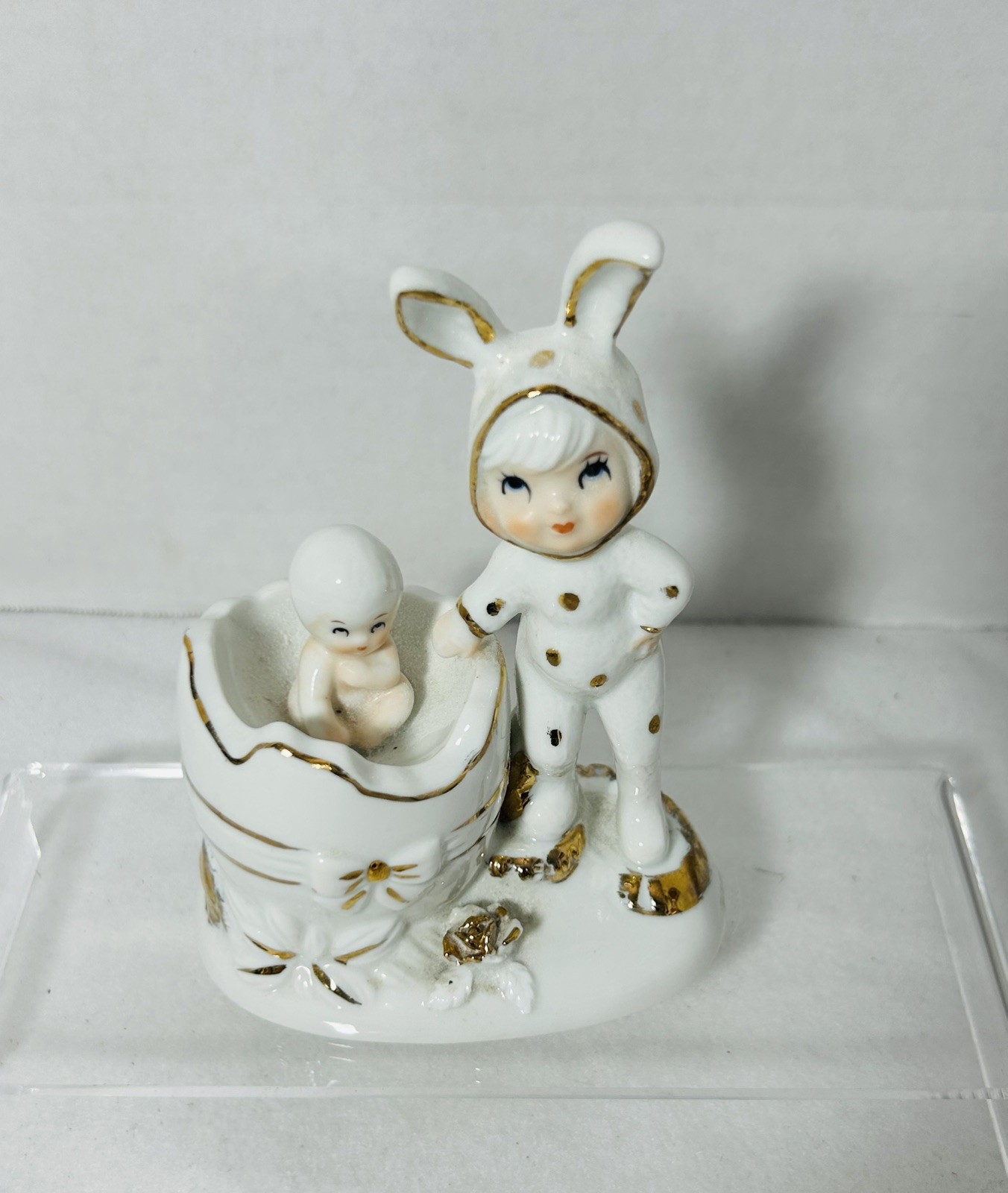 Vintage Kitschy Easter Bunny W/ Cracked Egg with Baby Gold Trim figurine. Vintage Kitschy Easter Bunny W/ Cracked Egg with Baby Gold Trim figurine.