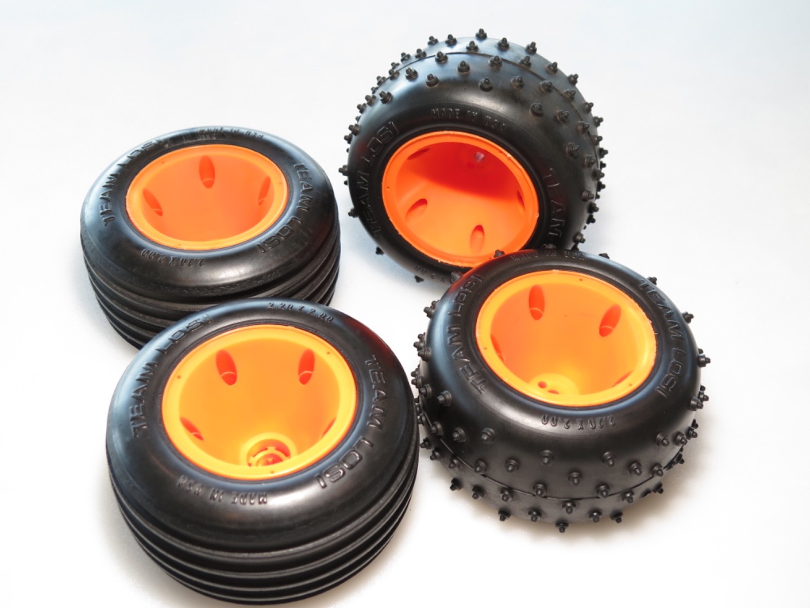 L22-3447 VINTAGE TEAM LOSI JRXT TRUCK FRONT REAR TIRES ORANGE WHEELS