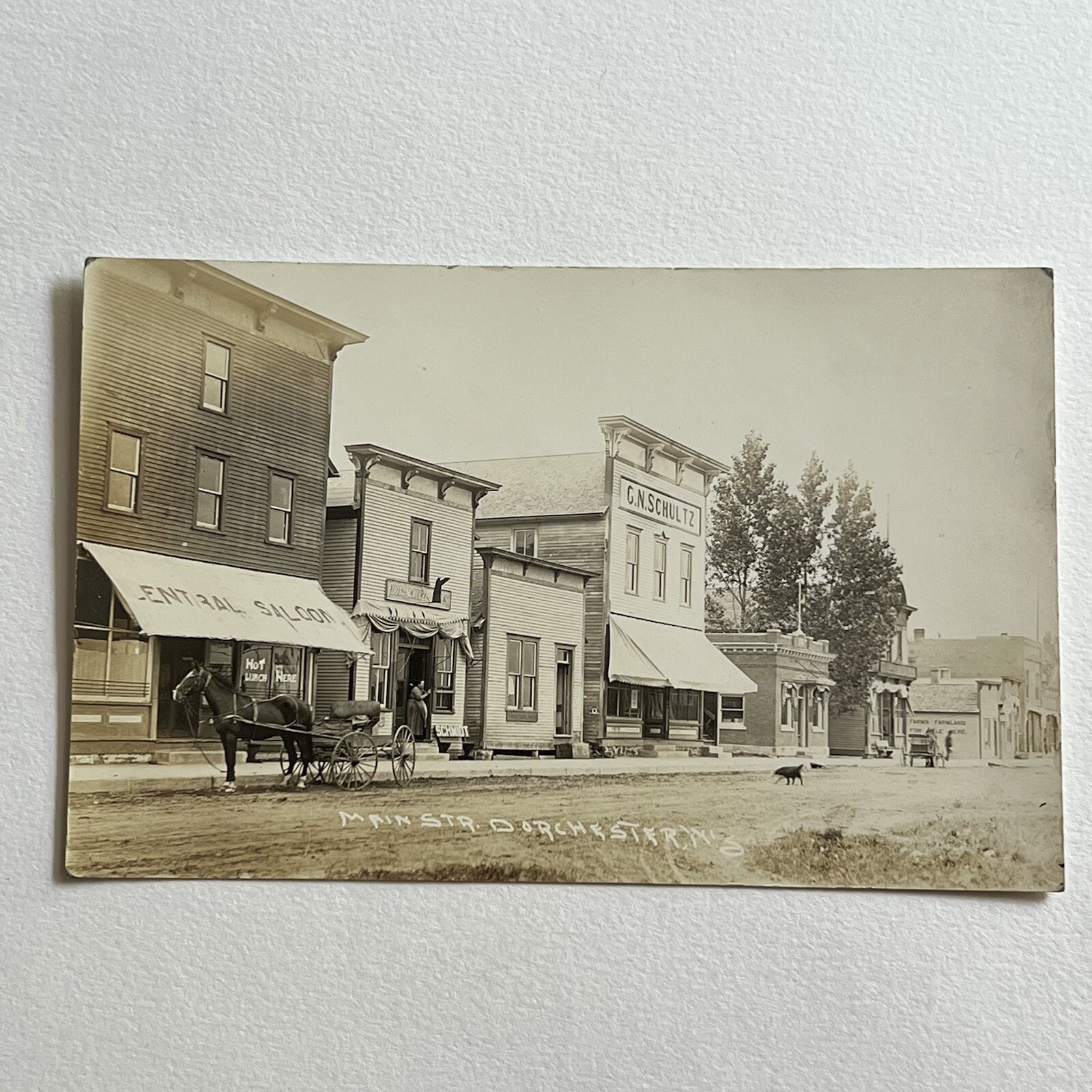 Antique RPPC Real Photograph Postcard Street View Buildings Saloon Dorchester WI