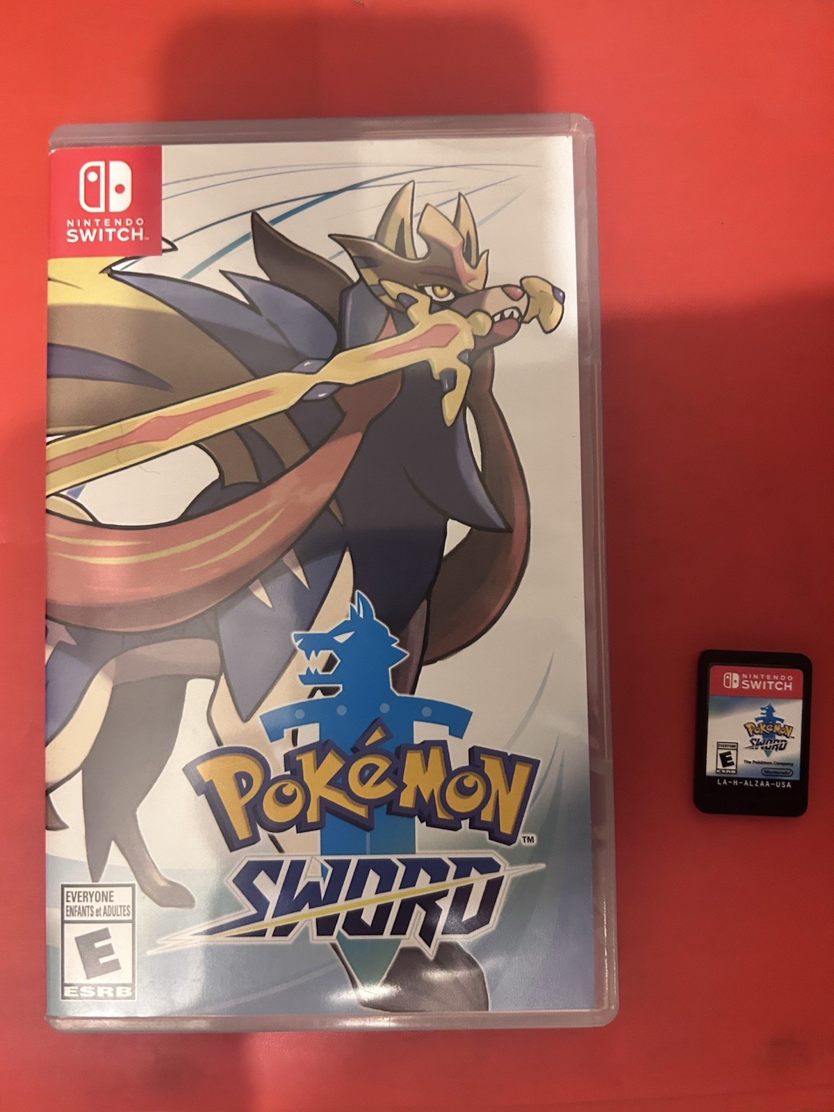 Nintendo Pokémon Sword w/ Case & Manual - Switch, E-Everyone, NTSC-U/C Nintendo Pokémon Sword w/ Case & Manual - Switch, E-Everyone, NTSC-U/C