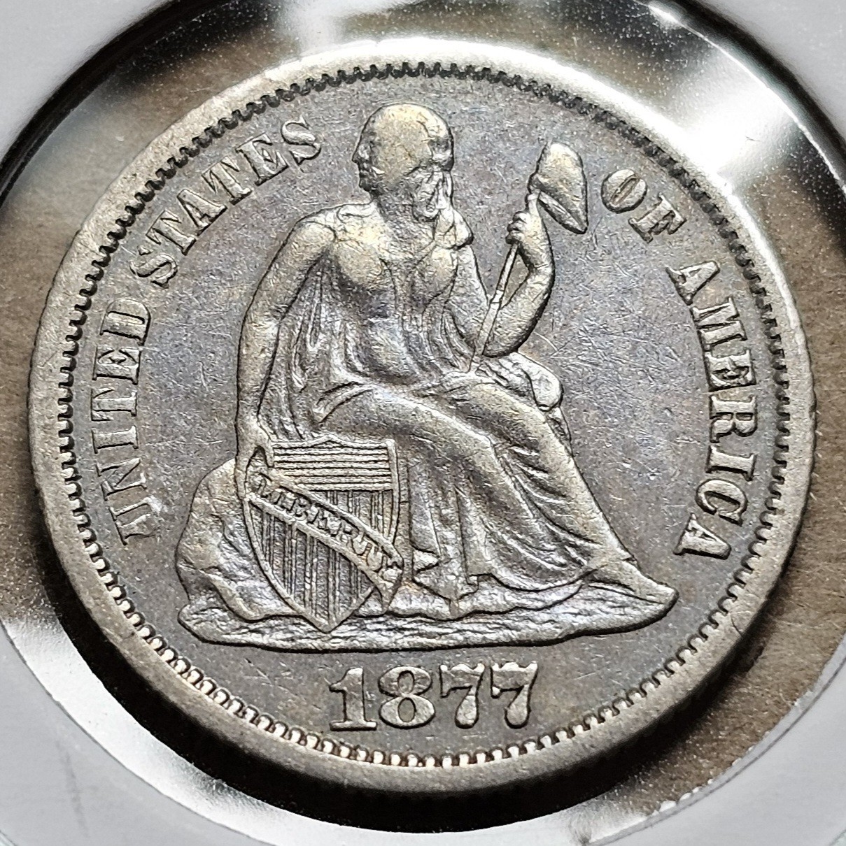 1877 Carson City Seated Liberty Dime +XF/AU