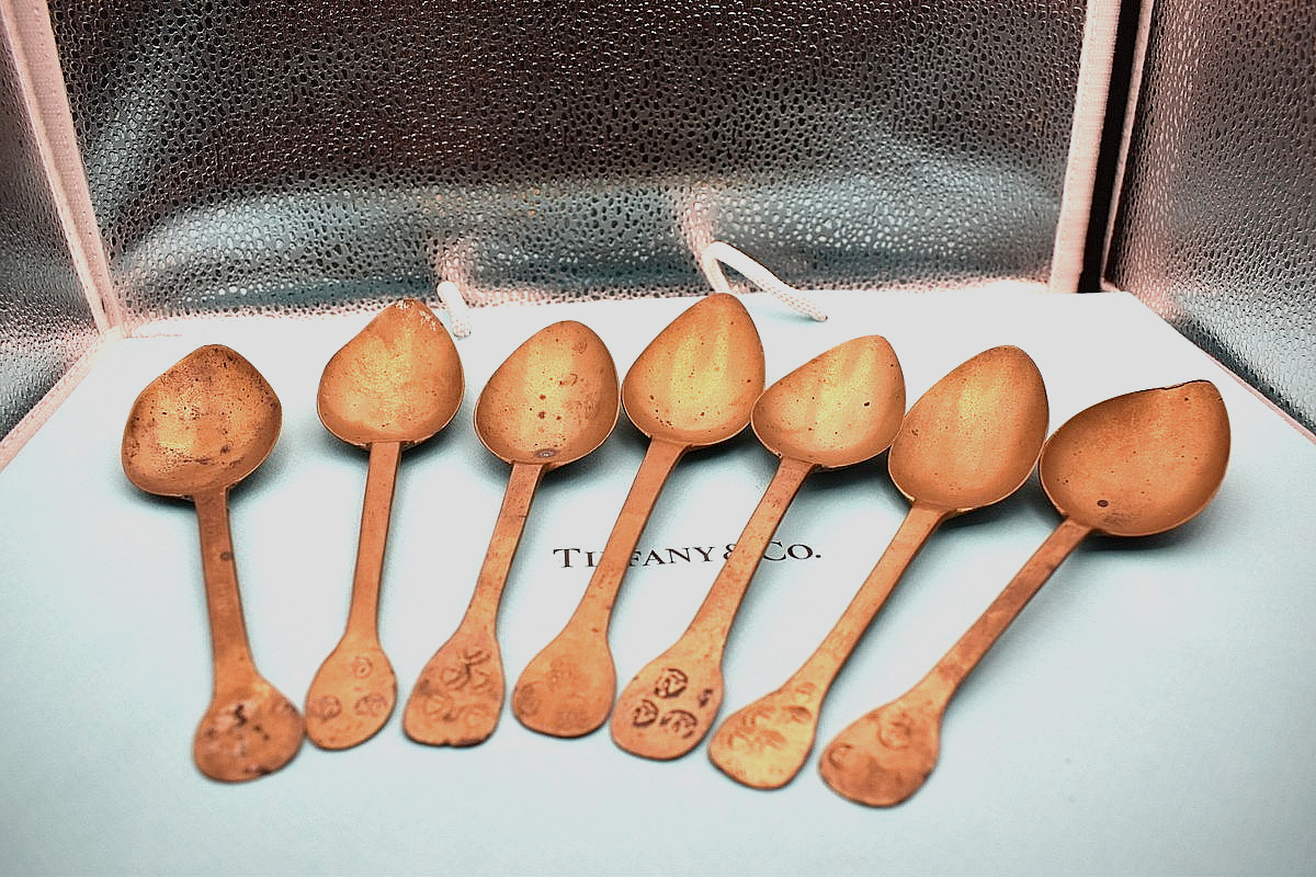 7 Antique French brass 1910 spoons. Maker Mark: Aube Mace, Heart, Crown, AL & ON