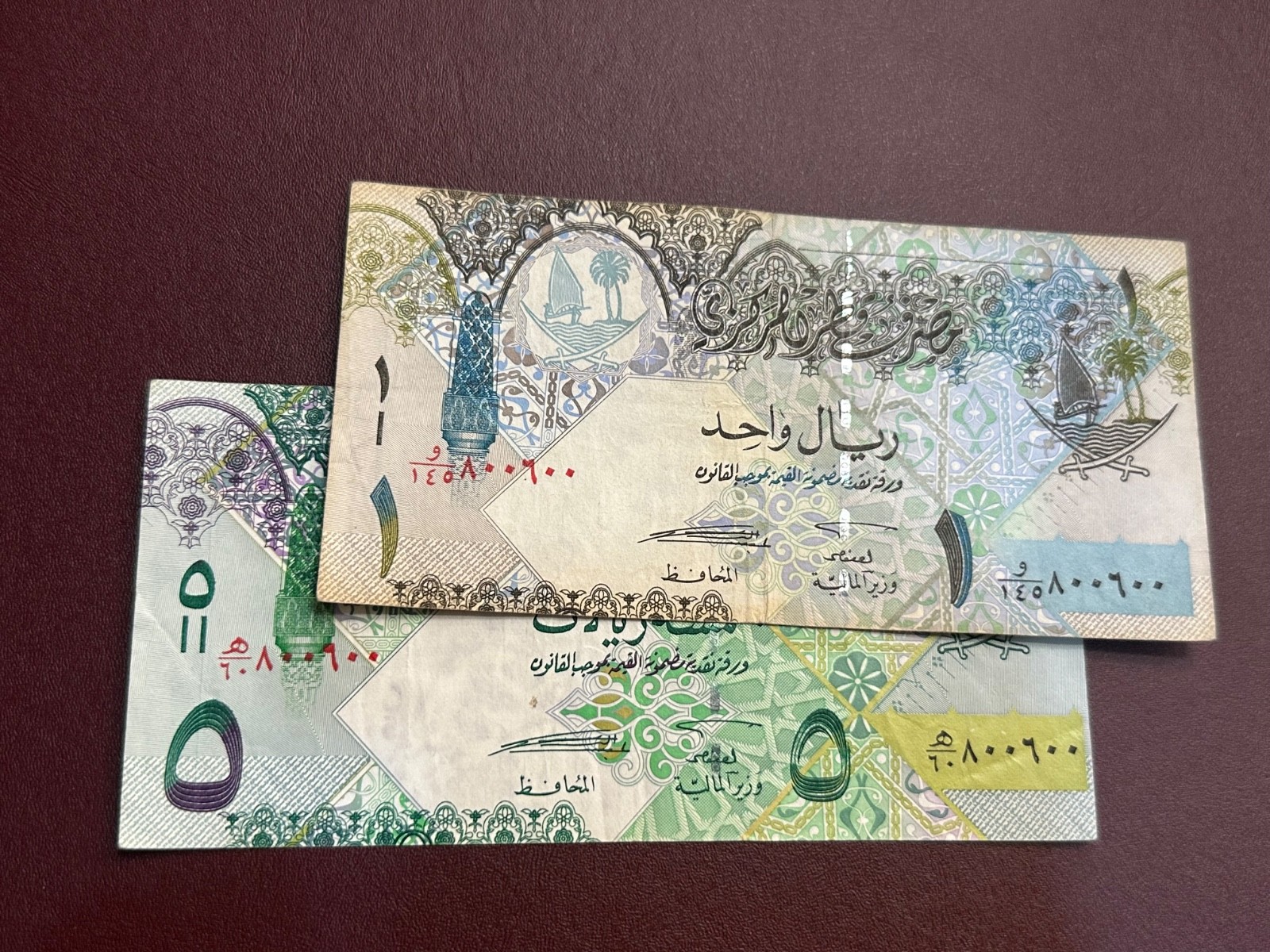 state of Qatar both with serial NO 800600 / see picture to know condition.