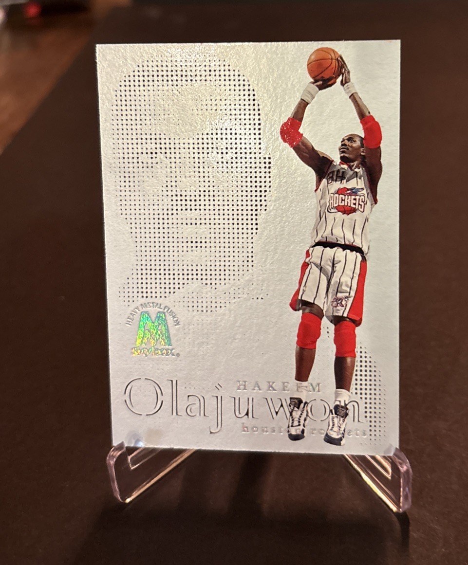 SkyBox 1998-99 Molten Metal Fusion Heavy Metal Hakeem Olajuwon #10F Rockets