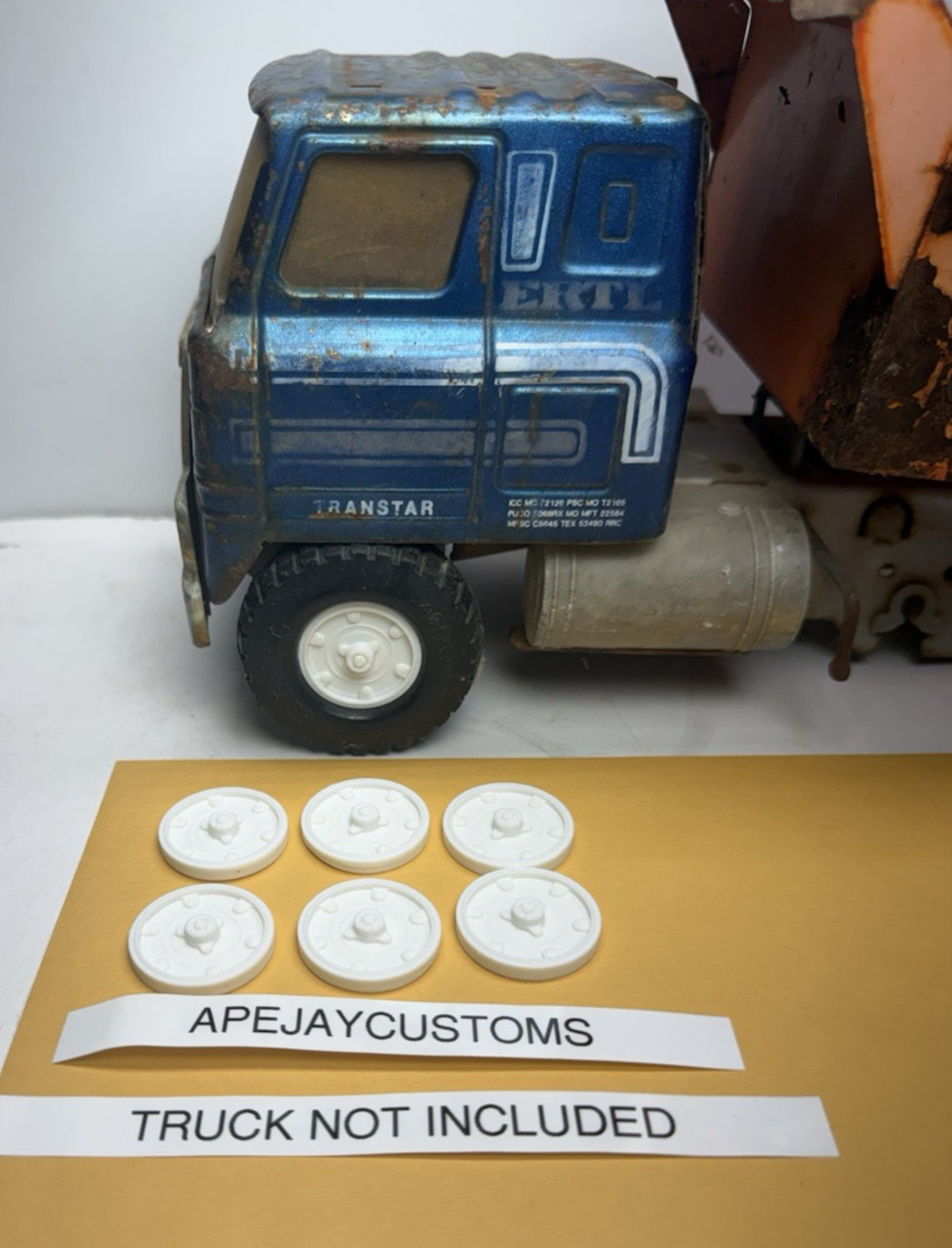 6 new hubcaps for ertl international transtar , or gmc truck