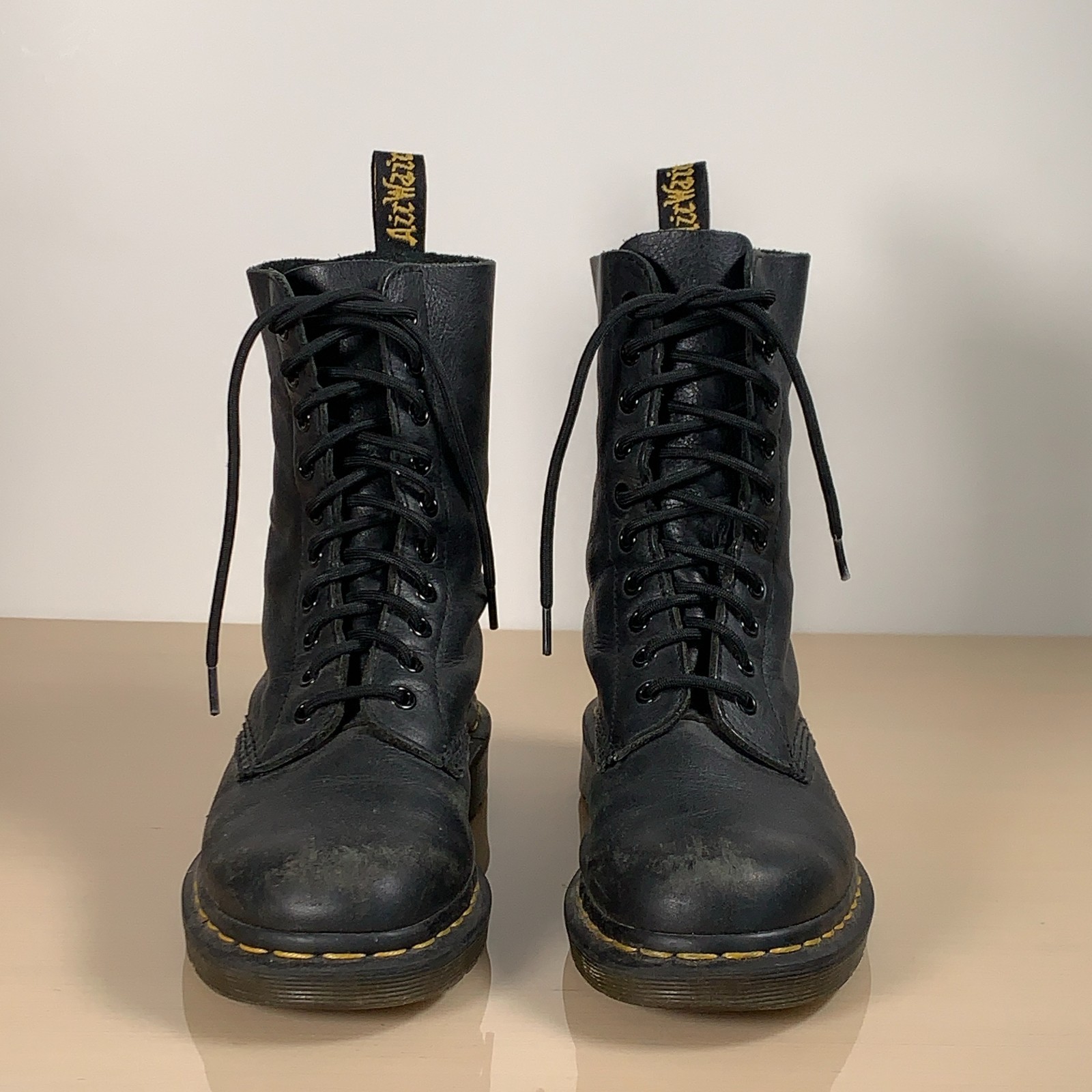 Doc Martens Women\'s size 7 - black 10-eye lace up boots visible wear on toe