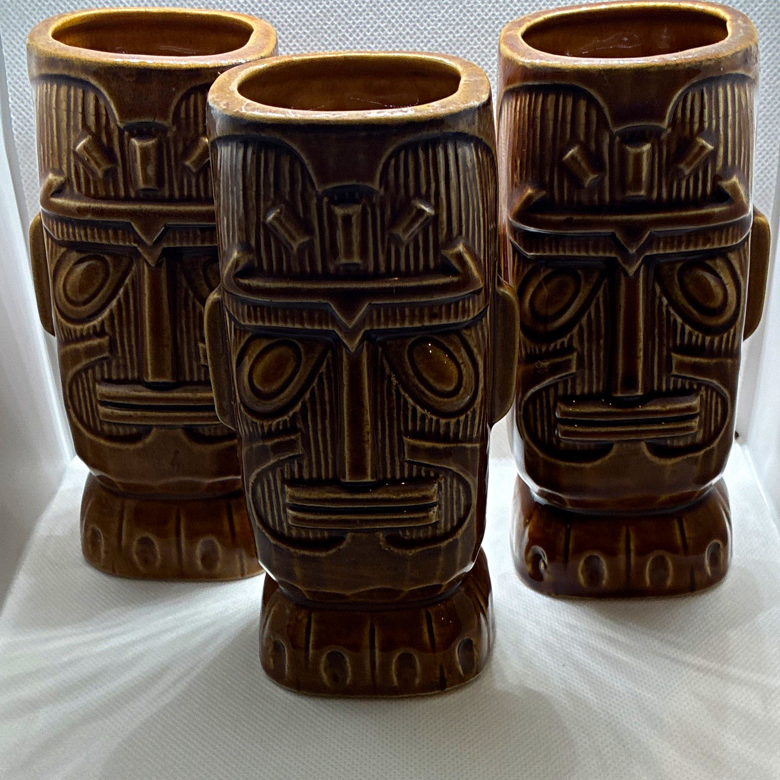 Set of 3 Brown Ceramic Tiki Mugs Hawaiian Ownership History Not Available Set of 3 Brown Ceramic Tiki Mugs Hawaiian Ownership History Not Available