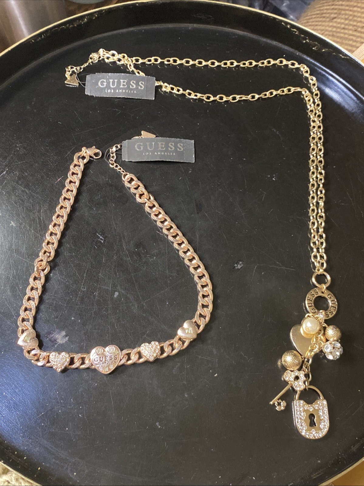 Two vintage W/tags GUESS Necklaces.Gold Tone,diamonds,hearts,lock&key& gorgeous Two vintage W/tags GUESS Necklaces.Gold Tone,diamonds,hearts,lock&key& gorgeous